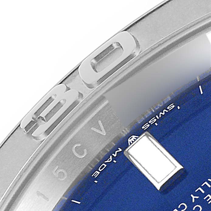 This image shows a close-up of the bezel and part of the dial of a Rolex Yacht-Master 126622 Men's Stainless Steel Blue Dial 126622 Men's Stainless Steel Blue Dial watch, including part of its "SWISS MADE" inscription.