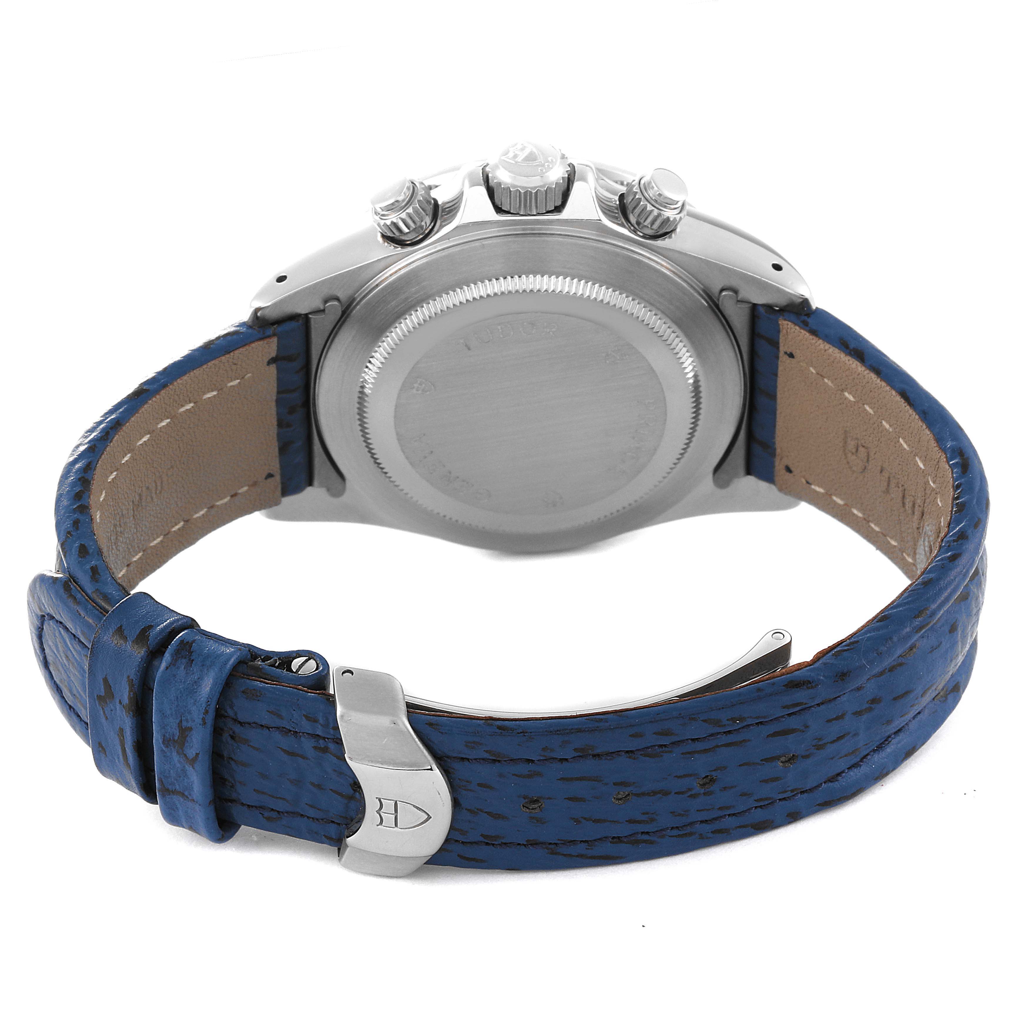 The image shows the back view of a Tudor Tiger 79280 Men's Stainless Steel Blue Dial 79280 Men's Stainless Steel Blue Dial model watch, displaying its case, crown, pushers, and blue leather strap.