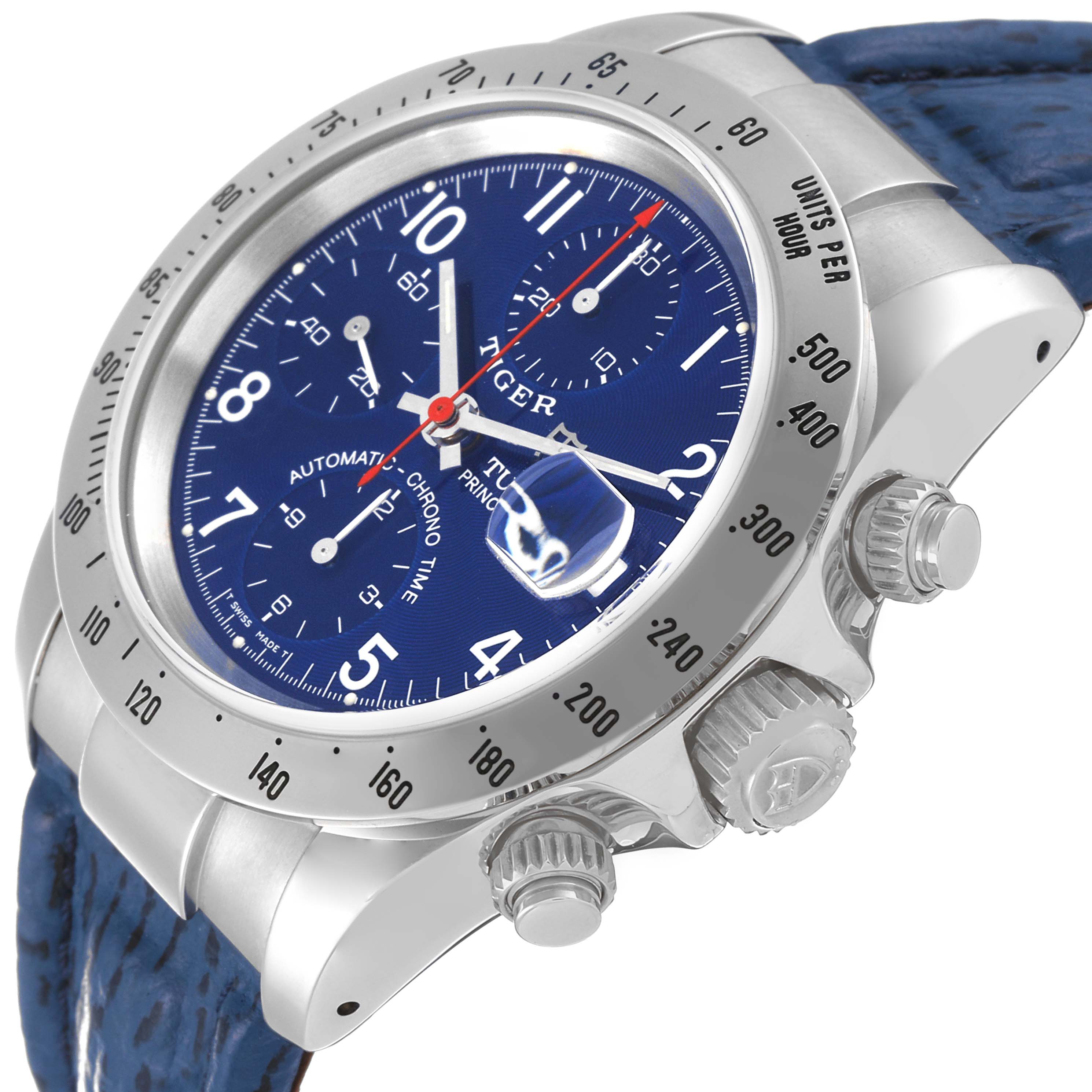The image shows a side angle of a Tudor Tiger 79280 Men's Stainless Steel Blue Dial 79280 Men's Stainless Steel Blue Dial model watch, highlighting its dials, crown, bezel, and blue strap.