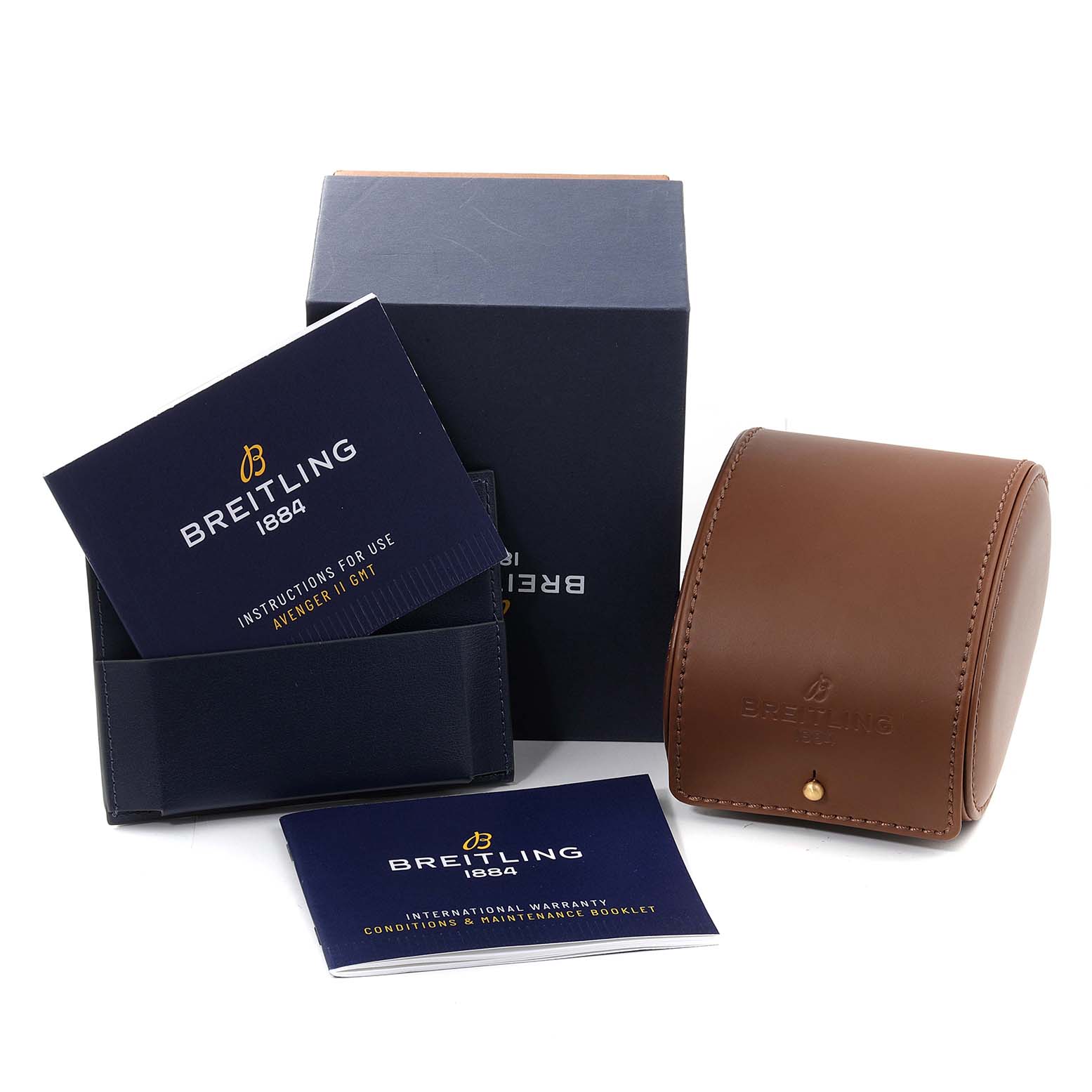 The image shows accessories for the Breitling Avenger A3239011-C872-170A Men's Stainless Steel Mother of Pearl Dial A3239011-C872-170A Men's Stainless Steel Mother of Pearl Dial watch including a box, brown leather case, instruction booklet, and warranty card.