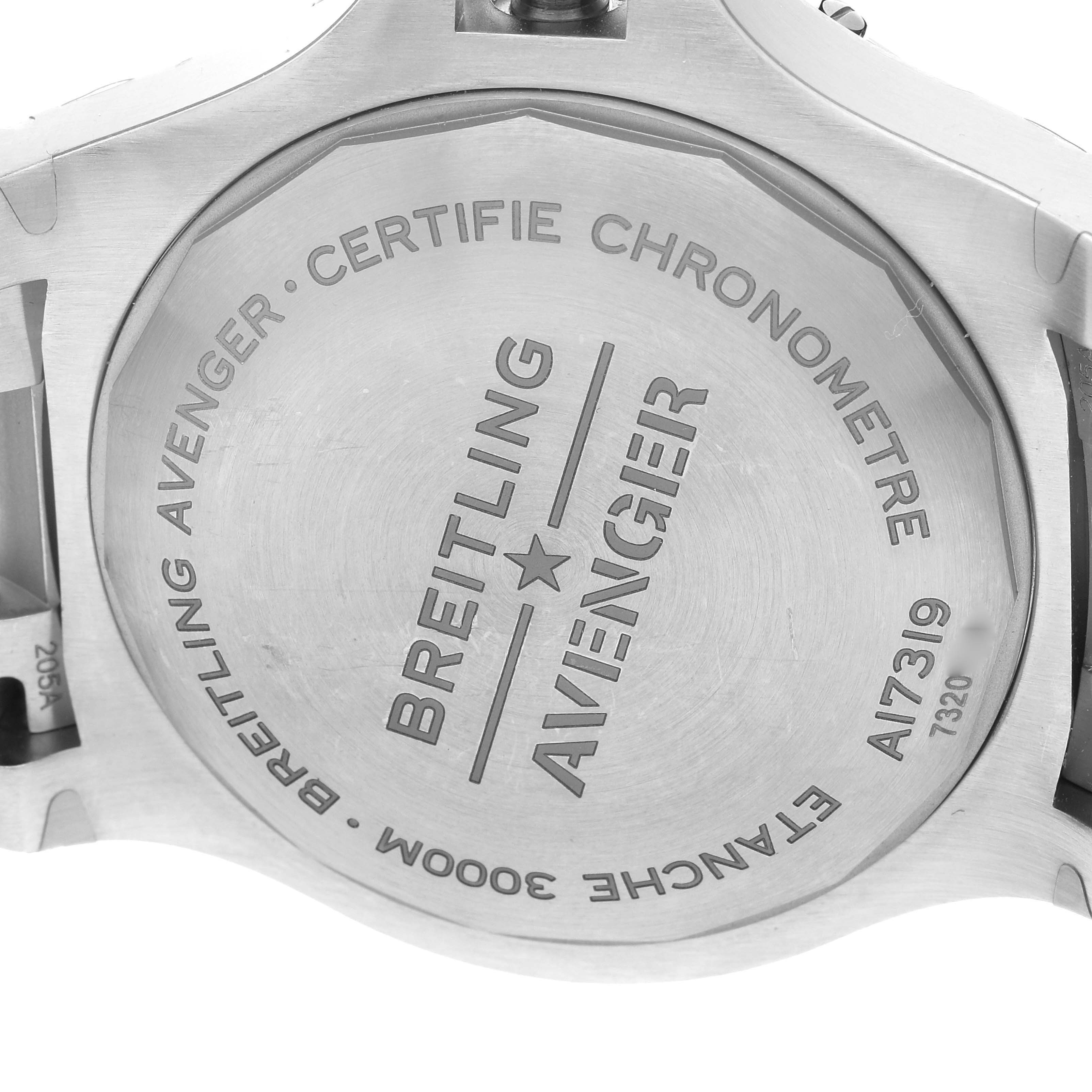 The image shows the back of a Breitling Avenger A17319 Men's Stainless Steel Yellow Dial A17319 Men's Stainless Steel Yellow Dial watch, highlighting its case back with engraved details.