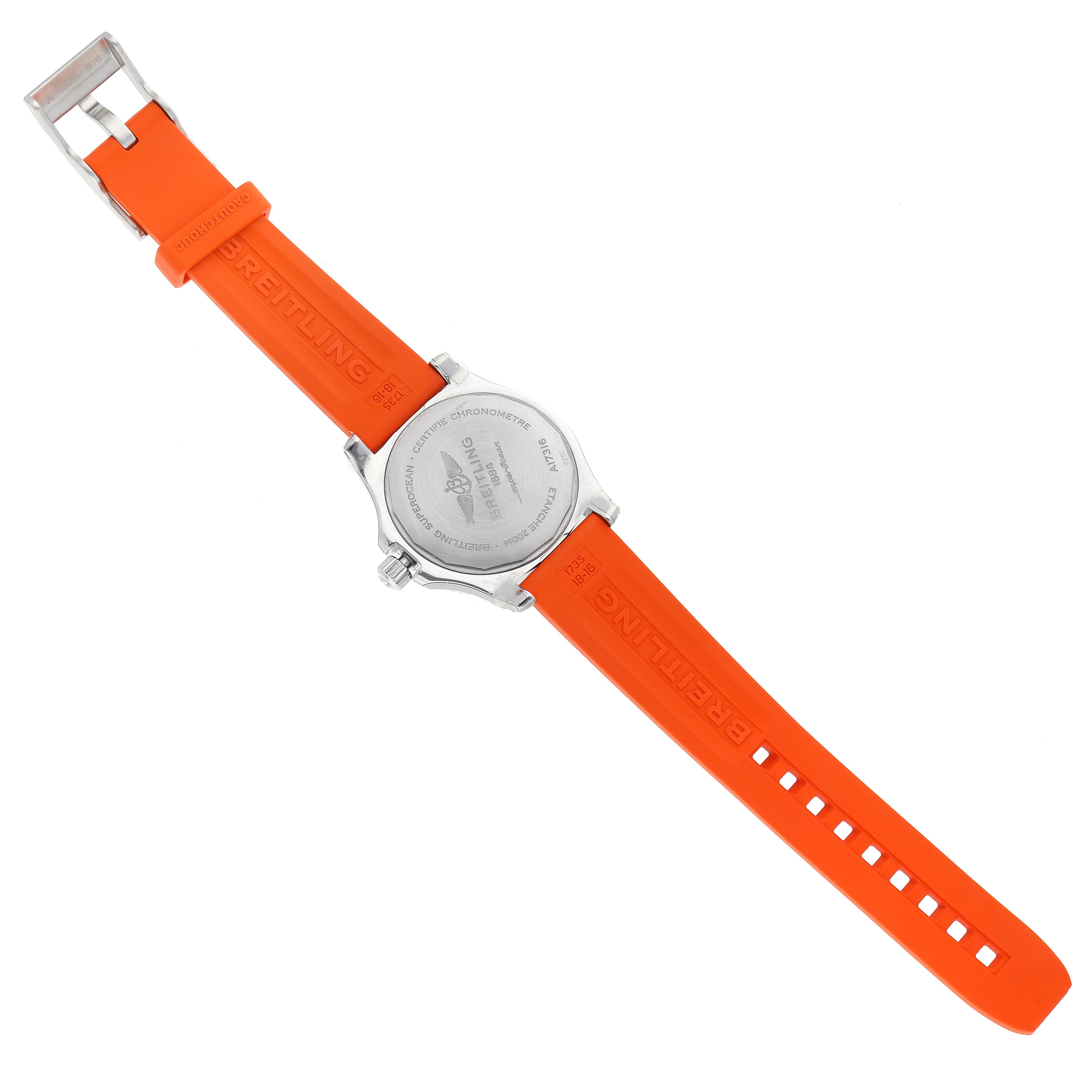 This image shows the back and orange strap of the Breitling A17316 Women's Stainless Steel Orange Dial A17316 Women's Stainless Steel Orange Dial Superocean 36mm Orange Dial Steel Ladies Watch A17316 Unworn model.