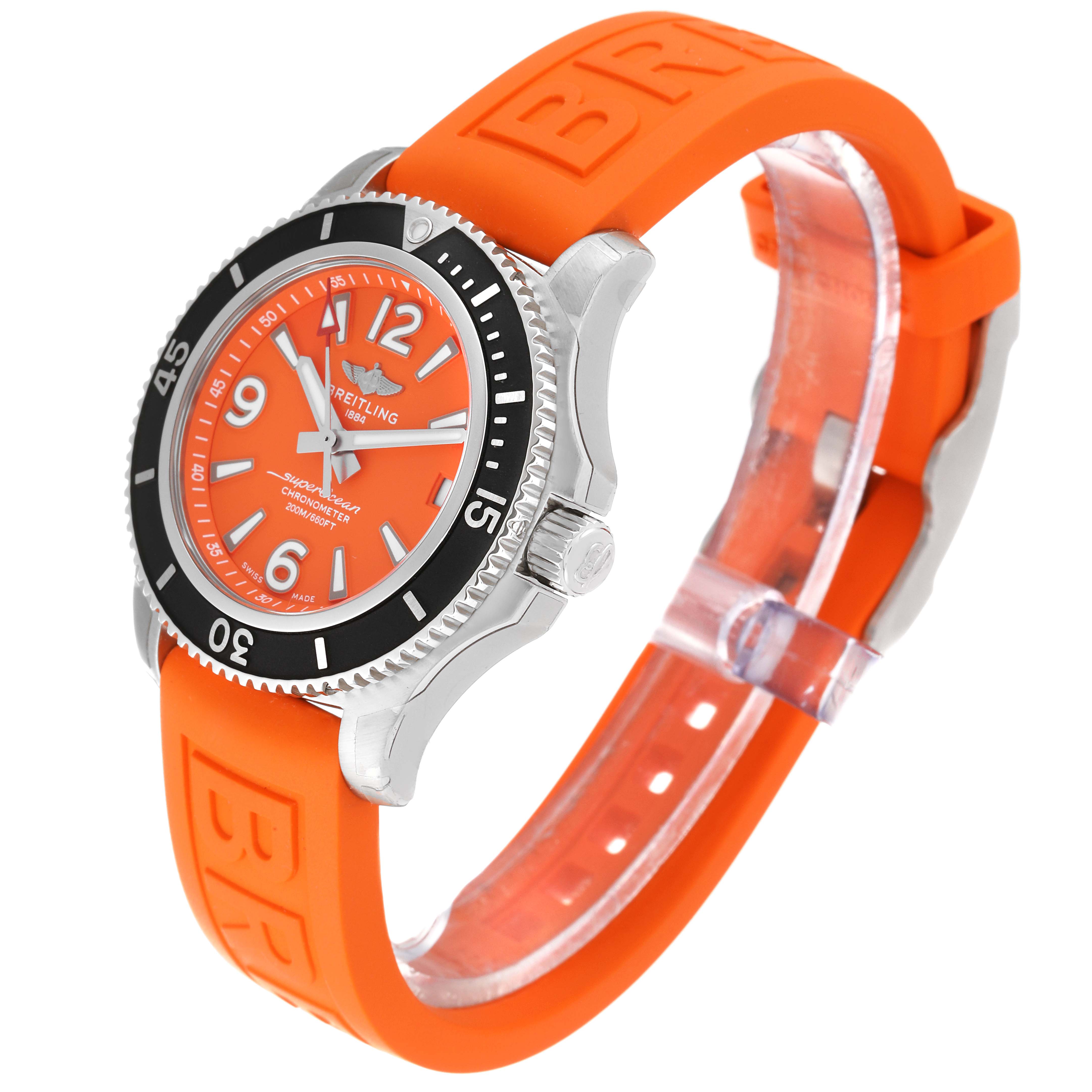 The image shows a side angle of the Breitling A17316 Women's Stainless Steel Orange Dial A17316 Women's Stainless Steel Orange Dial Superocean 36mm A17316 Ladies Watch with an orange dial and matching strap.