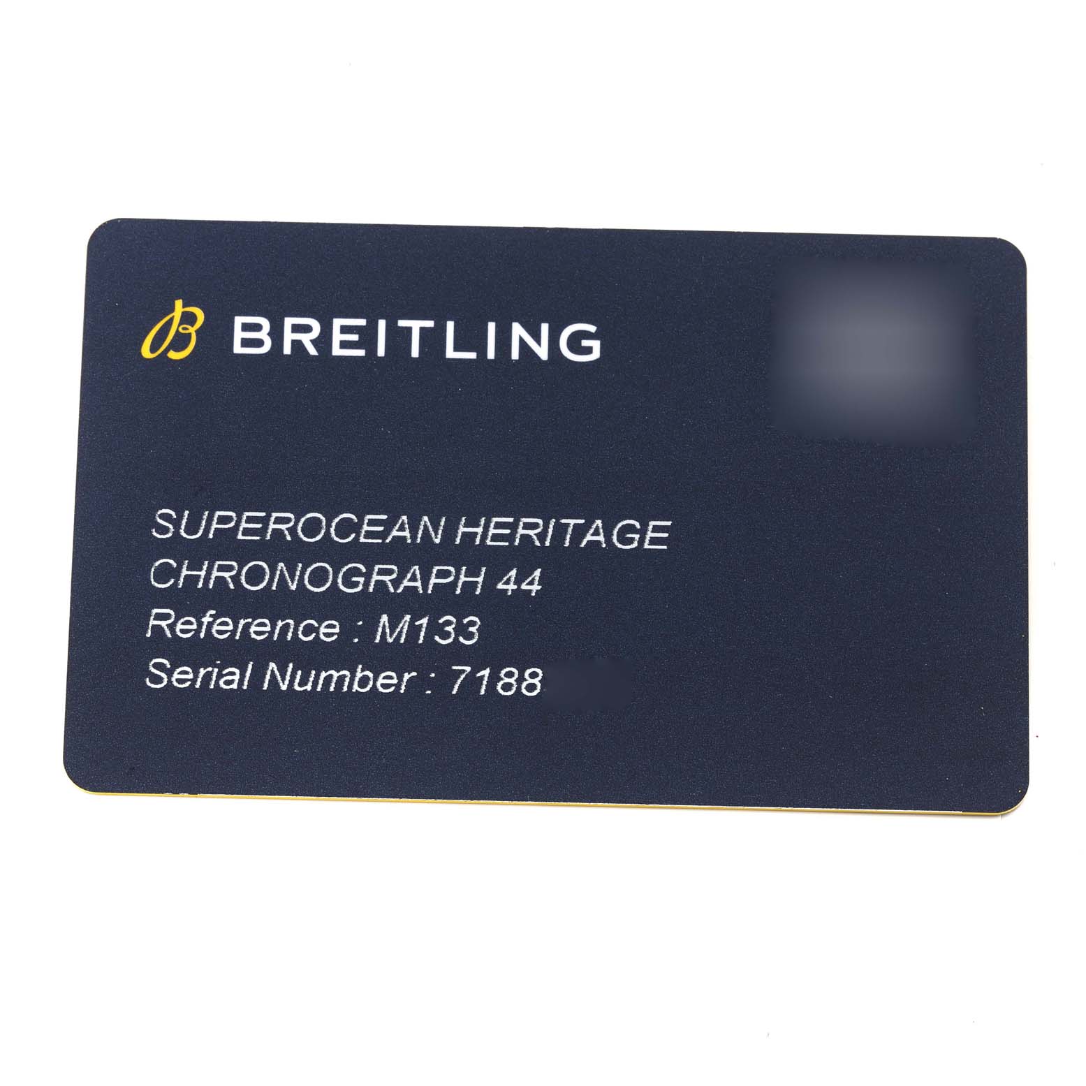 This image shows a warranty card for the Breitling Superocean M13313 Men
s Stainless Steel Blue Dial M13313 Men
s Stainless Steel Blue Dial Heritage Chronograph 44.