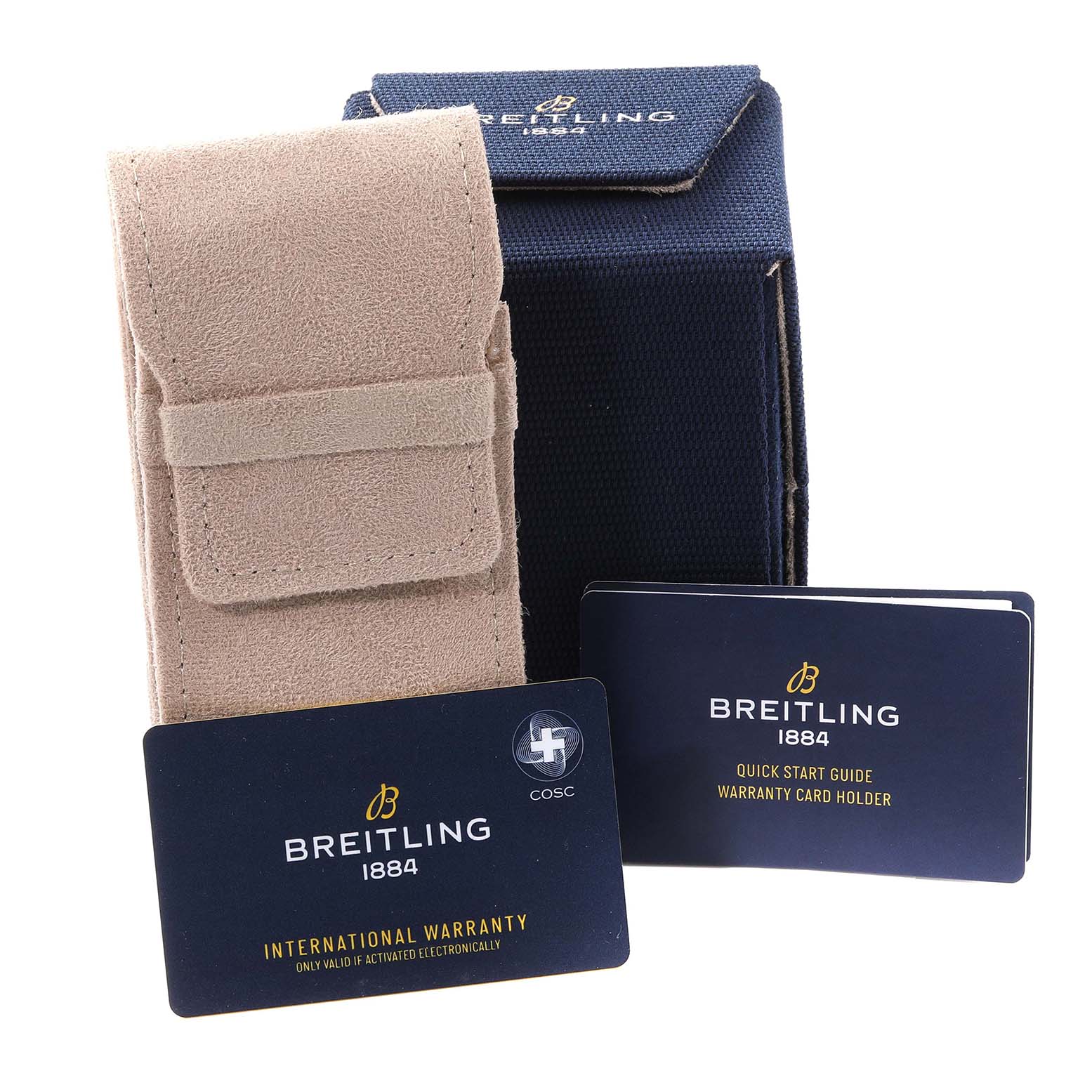 The image shows accessories for a Breitling Superocean U17368221B1S1 Men's Steel and Gold (two tone) Black Dial U17368221B1S1 Men's Steel and Gold (two tone) Black Dial watch, including a beige pouch, a blue box, and warranty cards.