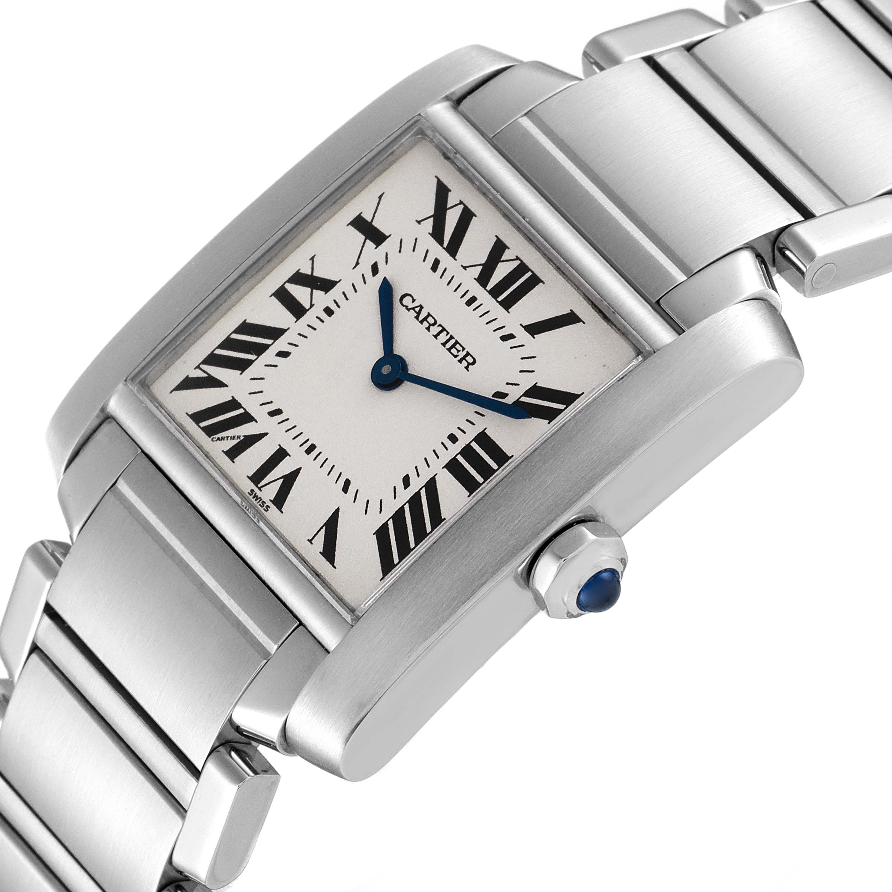 The image shows a Cartier Tank Française watch face, crown, and metallic bracelet at an angle.