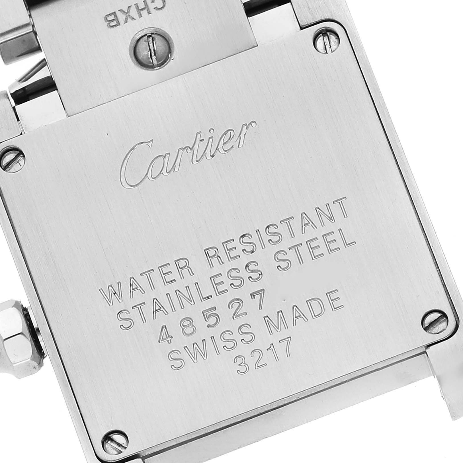 This is a close-up view of the back case of a Cartier Tank Francaise WE110006 Women's Stainless Steel Silver Dial WE110006 Women's Stainless Steel Silver Dial watch, showing the brand, model, and specifications.