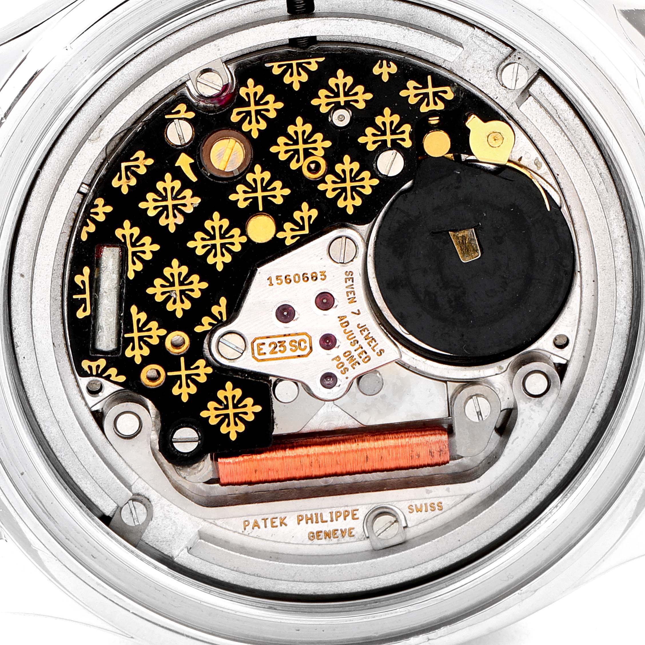 This close-up image shows the intricate inner mechanism of the Patek Philippe Aquanaut 5064A-001 Men's Stainless Steel Black Dial 5064A-001 Men's Stainless Steel Black Dial watch.