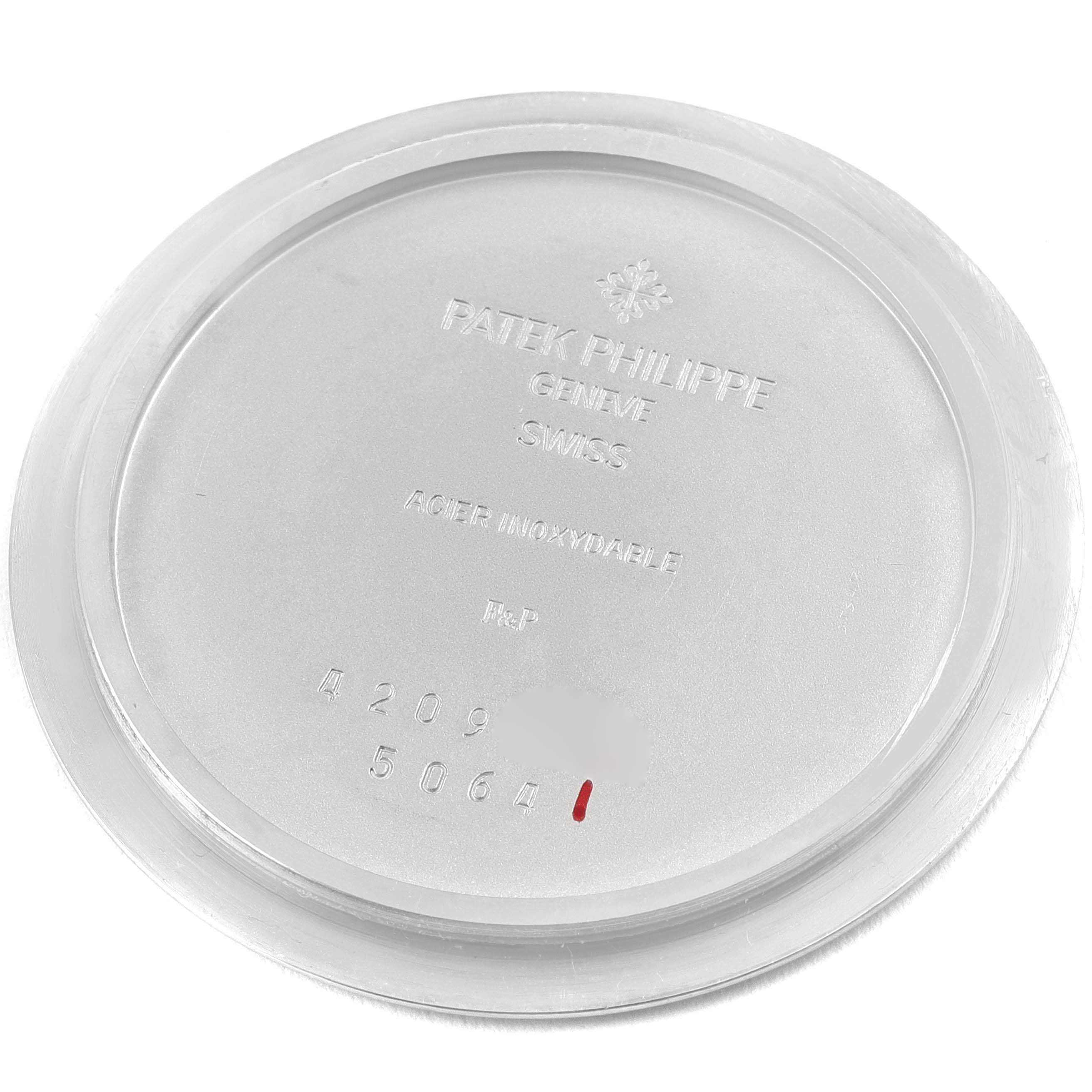 This image shows the back case cover of a Patek Philippe Aquanaut 5064A-001 Men's Stainless Steel Black Dial 5064A-001 Men's Stainless Steel Black Dial watch, displaying the brand's engravings and model details.