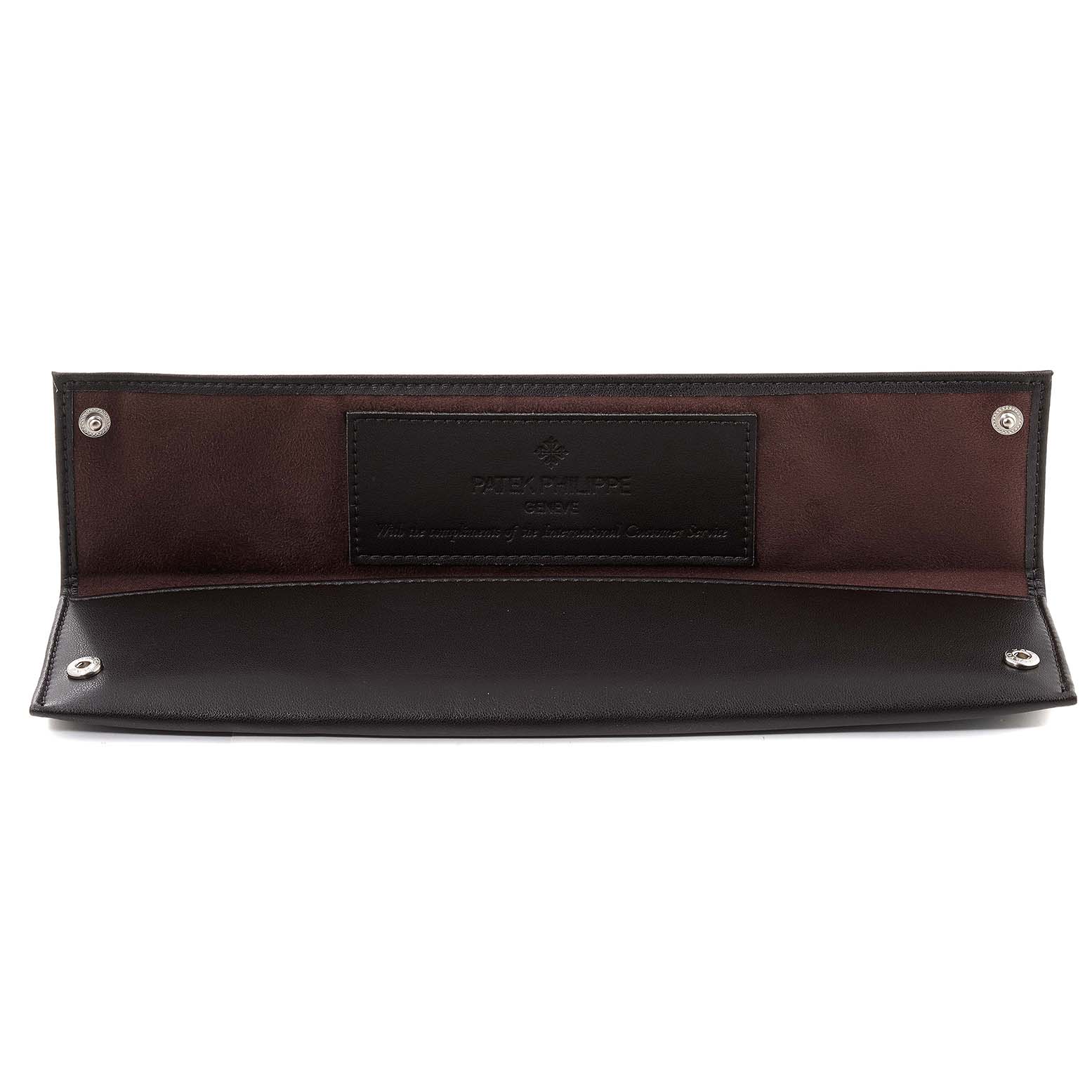 This image shows a black and brown leather case with snaps for the Patek Philippe Calatrava 5123R-001 Men's Rose Gold Silver Dial 5123R-001 Men's Rose Gold Silver Dial watch.