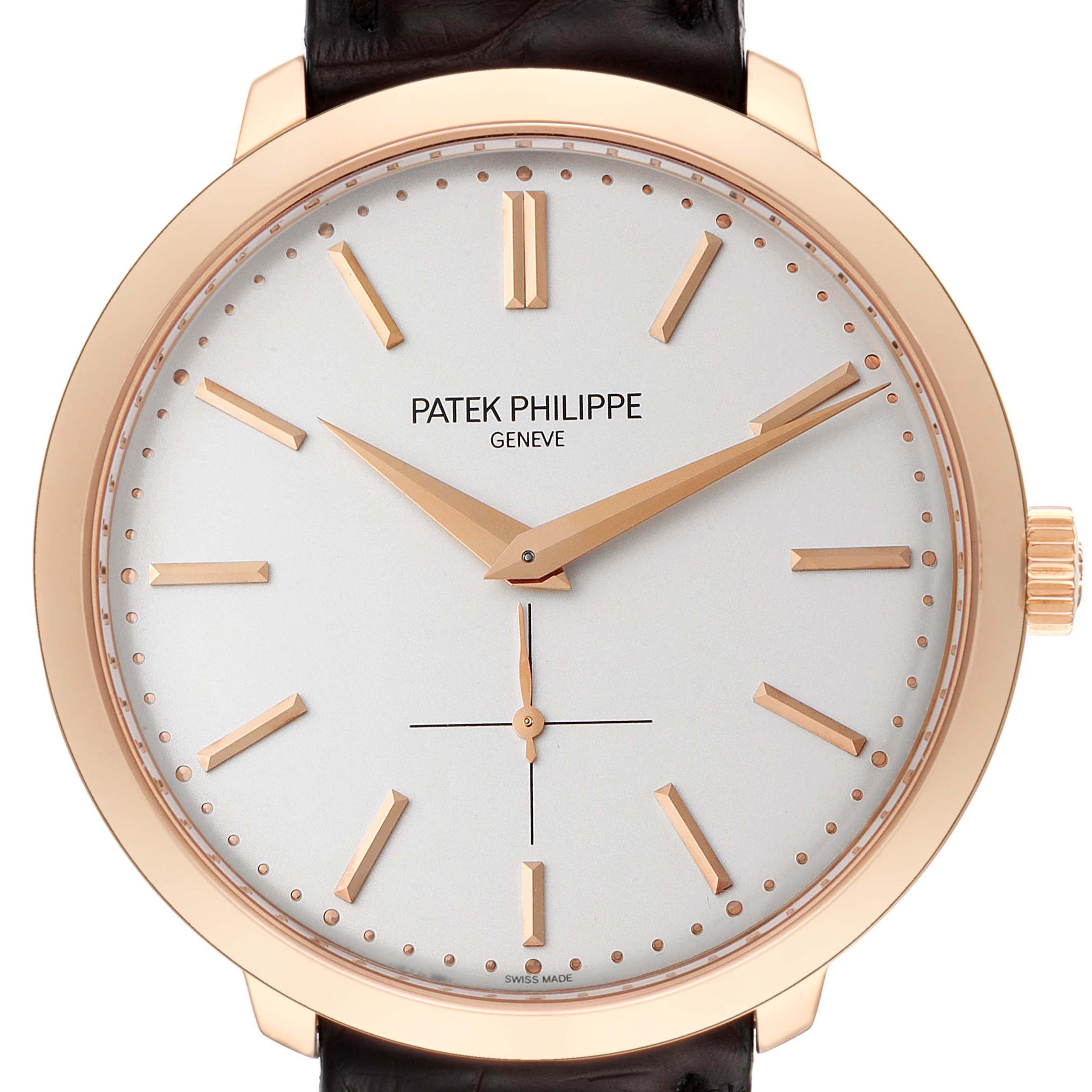 The image shows a frontal view of a Patek Philippe Calatrava 5123R-001 Men's Rose Gold Silver Dial 5123R-001 Men's Rose Gold Silver Dial watch, highlighting the dial, hands, and crown.
