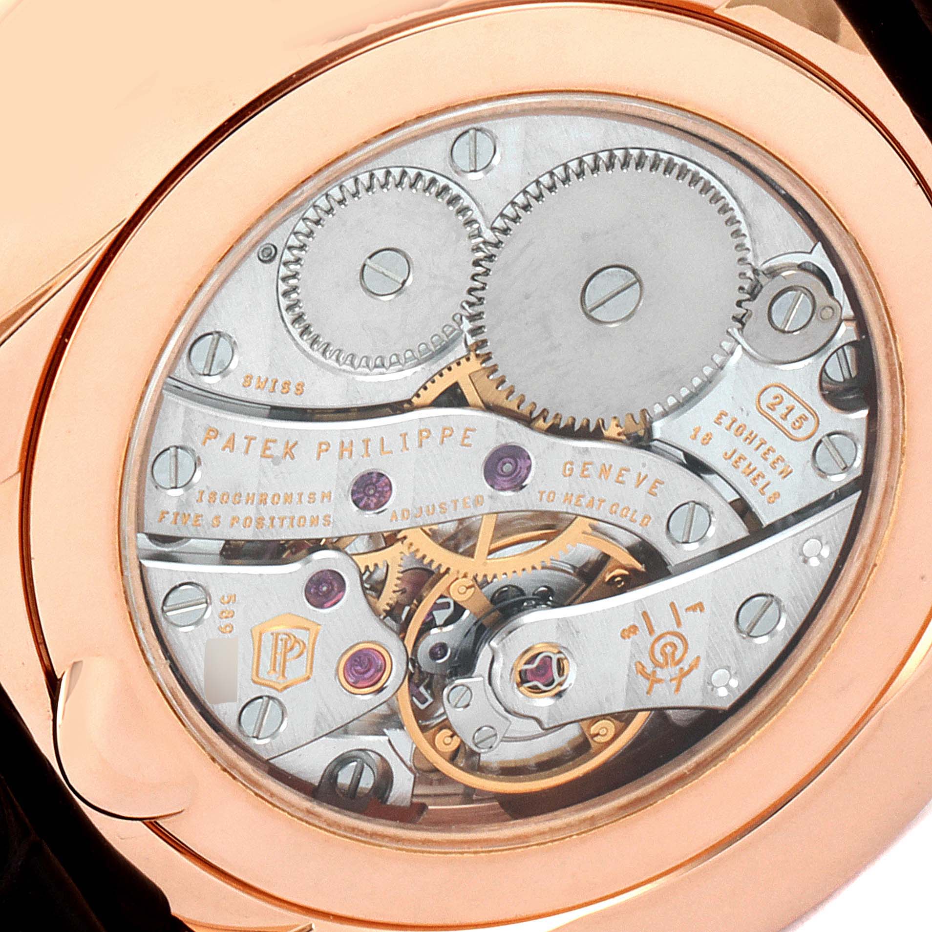 This image shows a detailed view of the movement and inner mechanics of the Patek Philippe Calatrava 5123R-001 Men's Rose Gold Silver Dial 5123R-001 Men's Rose Gold Silver Dial watch.