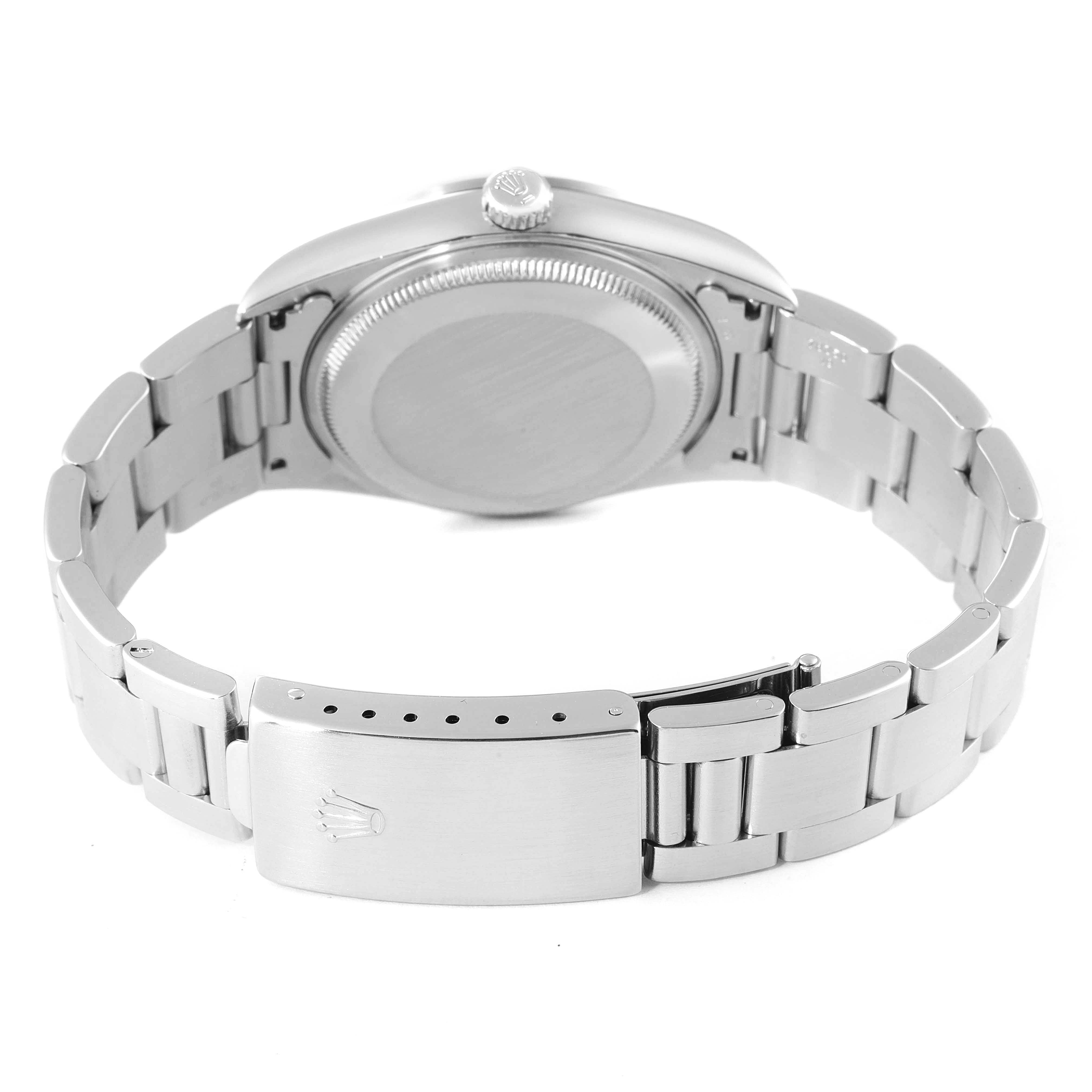 The image shows the back view of a Rolex Air-King 14000 Men's Stainless Steel Blue Dial 14000 Men's Stainless Steel Blue Dial watch, including its case back, crown, and clasp.