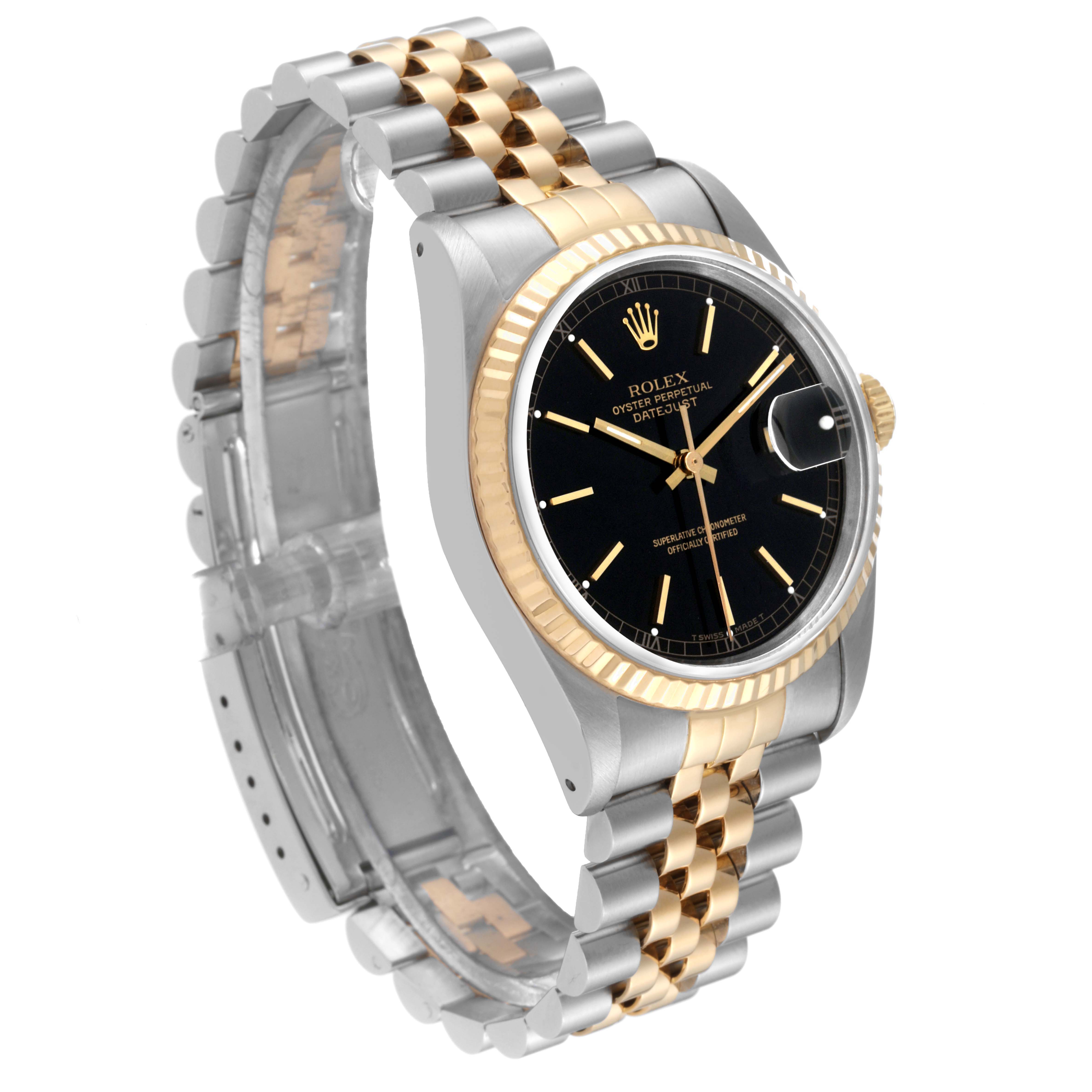 This image shows a Rolex Datejust 16233 Men's Steel and Gold (two tone) Black Dial 16233 Men's Steel and Gold (two tone) Black Dial watch at a three-quarter angle, highlighting its black dial, two-tone bracelet, and fluted bezel.