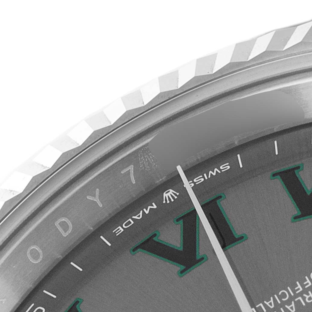 This close-up image shows the bezel, part of the dial, and the "Swiss Made" label of the Rolex Datejust 41 126334 Men
s Stainless Steel Grey Dial 126334 Men
s Stainless Steel Grey Dial watch.