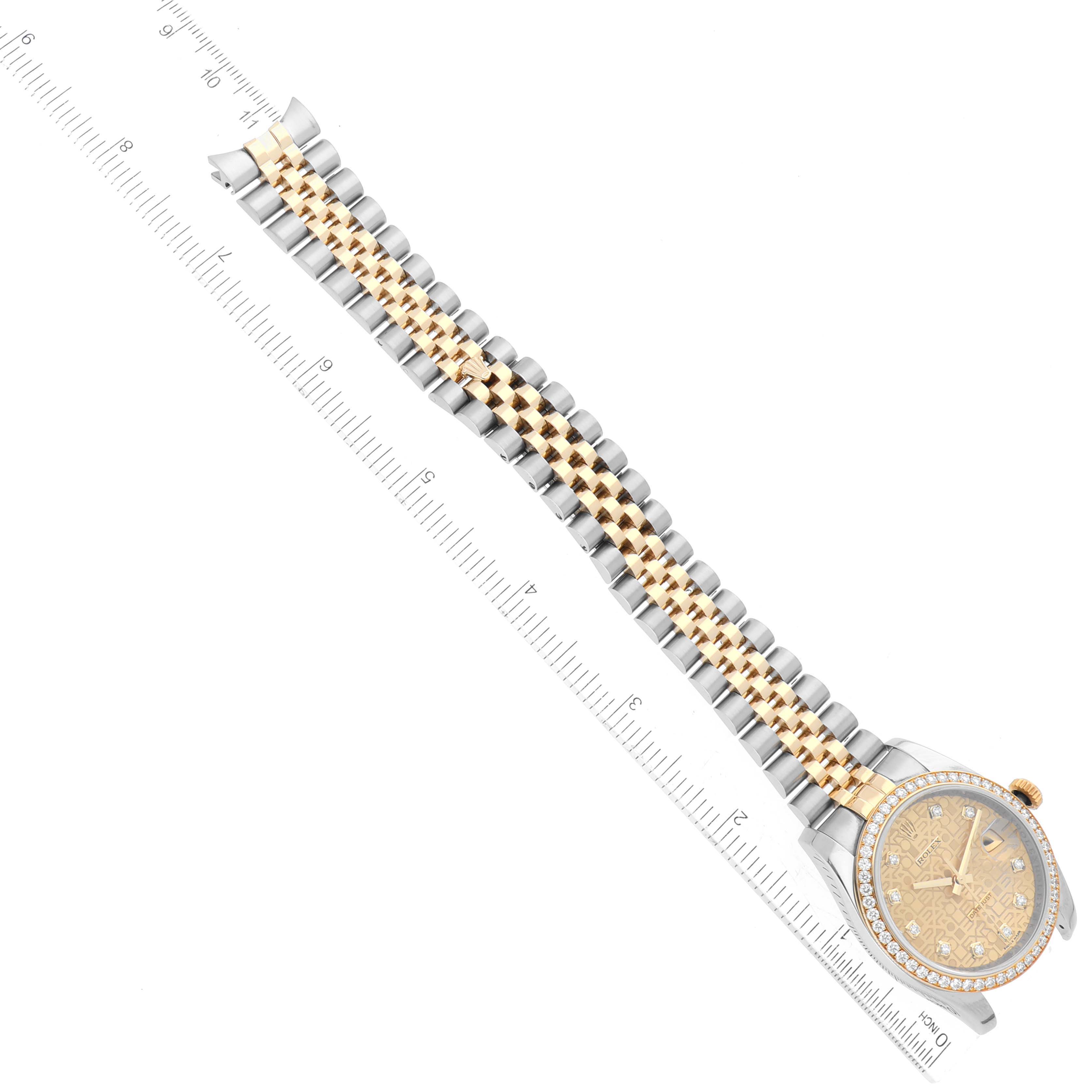The image shows a Rolex Datejust 116243 Men's Steel and Gold (two tone) Champagne Dial 116243 Men's Steel and Gold (two tone) Champagne Dial watch from a top-down angle, displaying its dial and two-tone bracelet next to a ruler for scale.