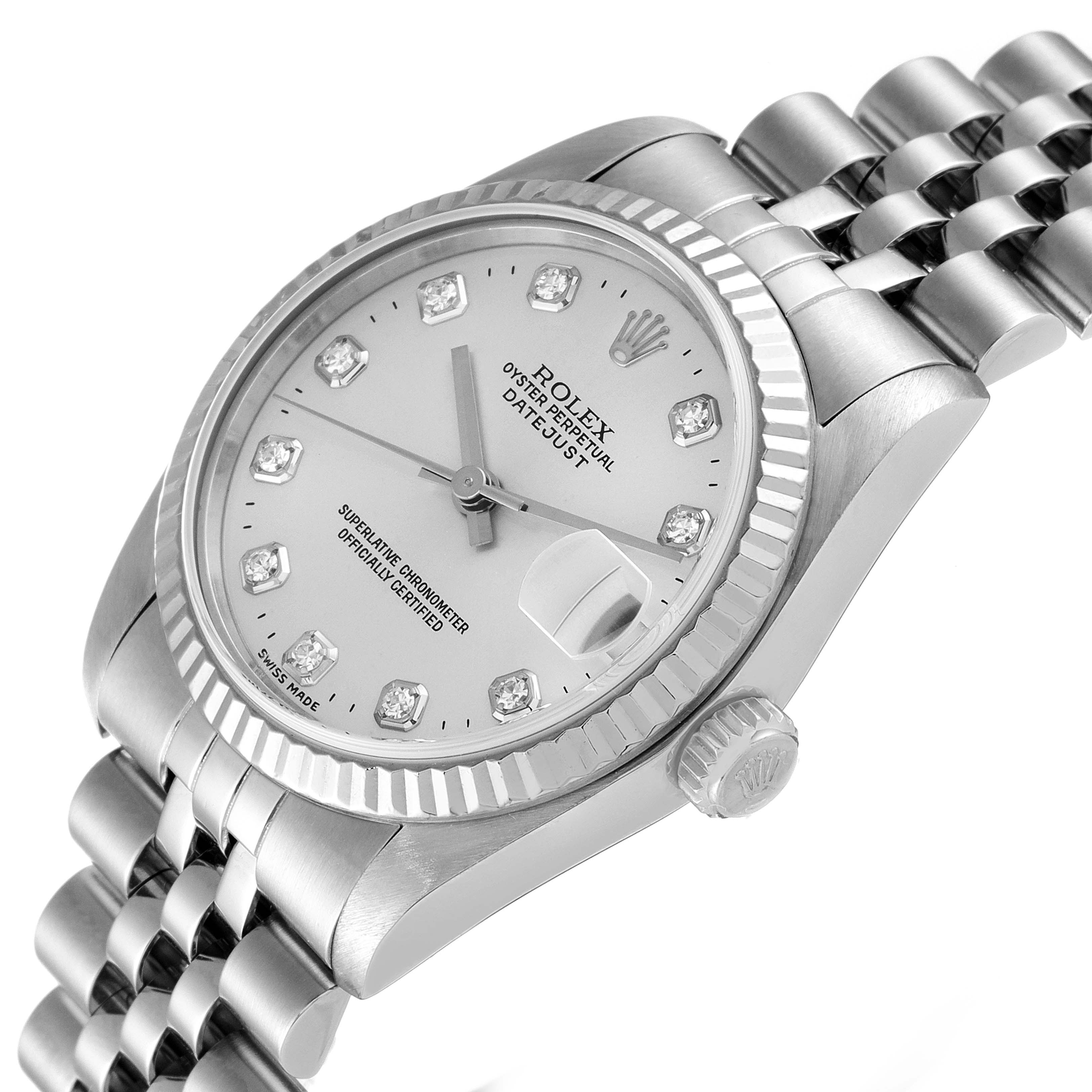 The image shows a close-up, angled view of a Mid-Size Rolex Oyster Perpetual Datejust, highlighting the dial, bezel, and bracelet.