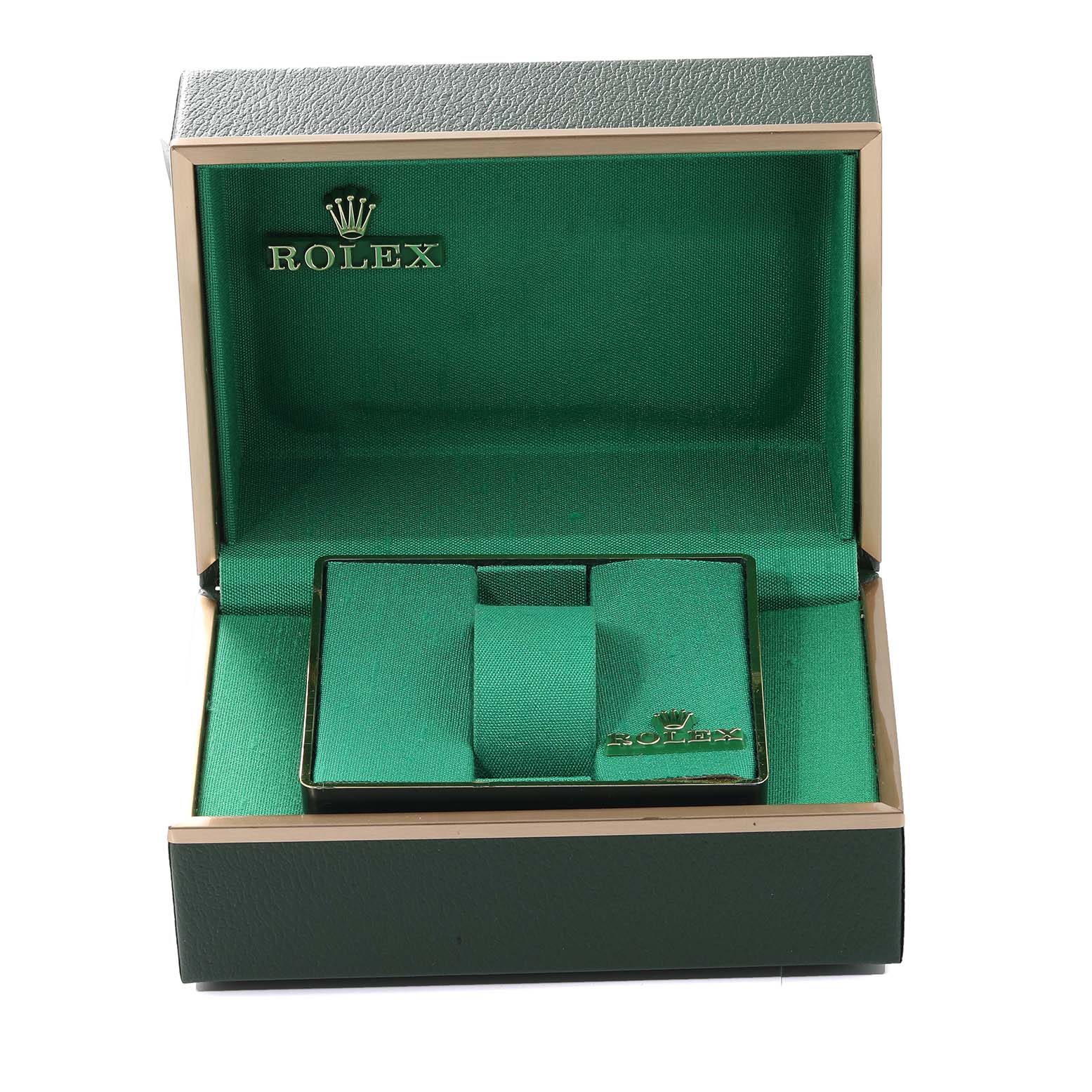 The image shows an empty green Rolex box for the Vintage Collection model from a front angle.