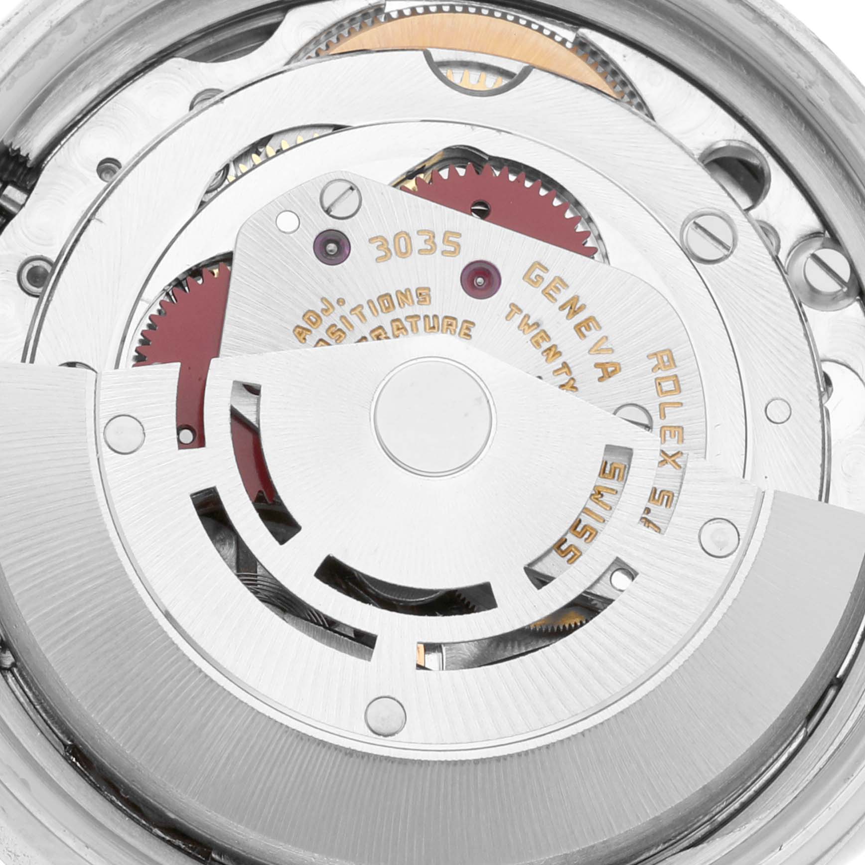 This is a detailed view of the internal movement mechanism of the Vintage Collection model by Rolex, showing gears and inscriptions.