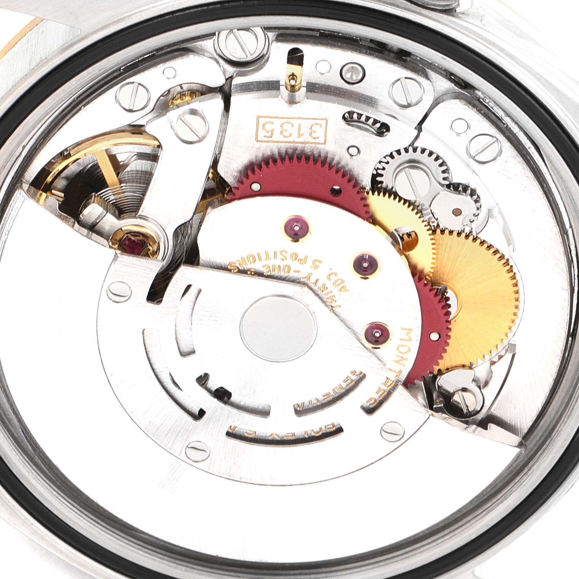 This image shows the intricate internal mechanism of a Rolex Datejust 16233 Men's Steel and Gold (two tone) White Dial 16233 Men's Steel and Gold (two tone) White Dial watch, highlighting gears and movement parts from a close-up angle.