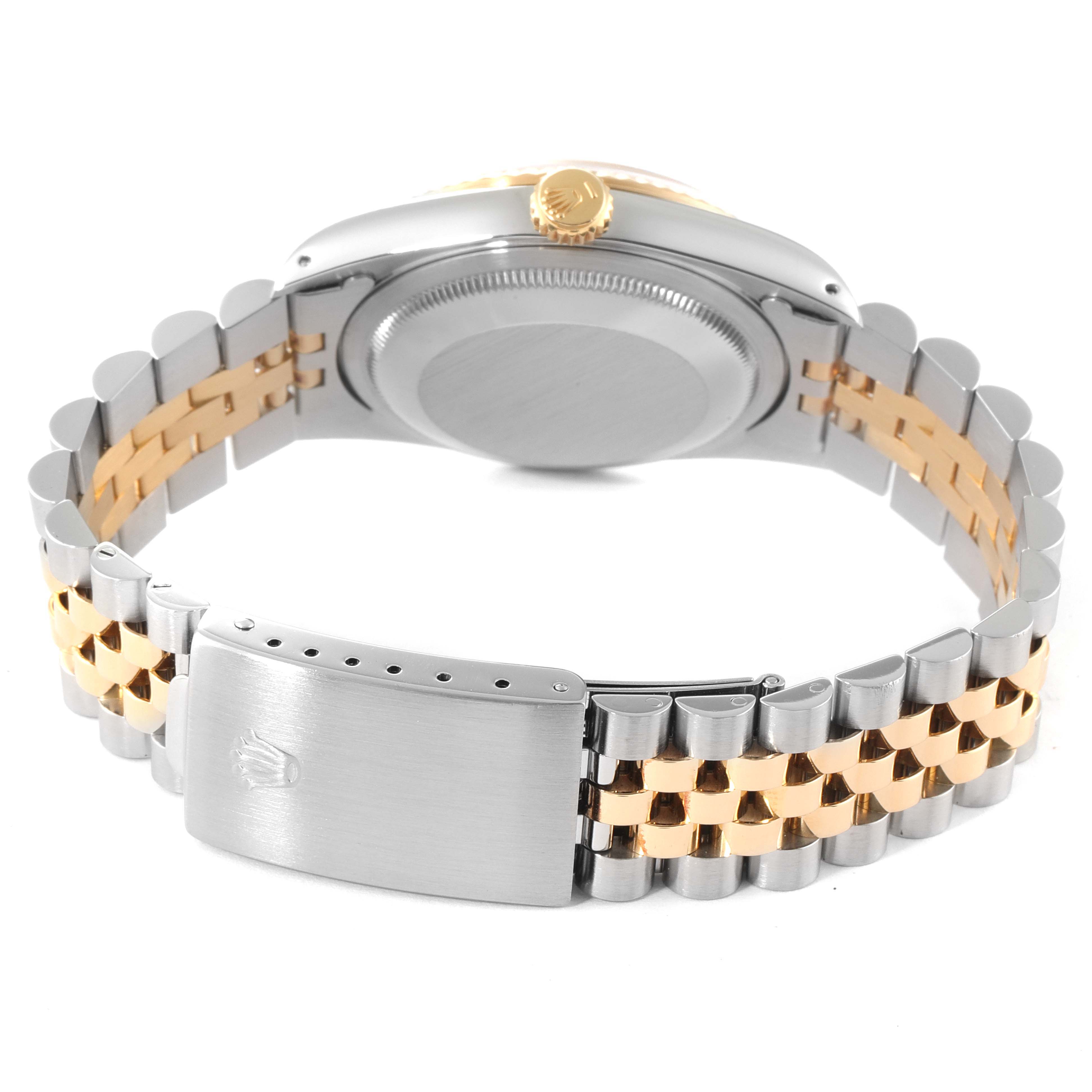 The image shows the back view of a Rolex Datejust 16233 Men's Steel and Gold (two tone) White Dial 16233 Men's Steel and Gold (two tone) White Dial, highlighting the case back and the two-tone Jubilee bracelet with the clasp.