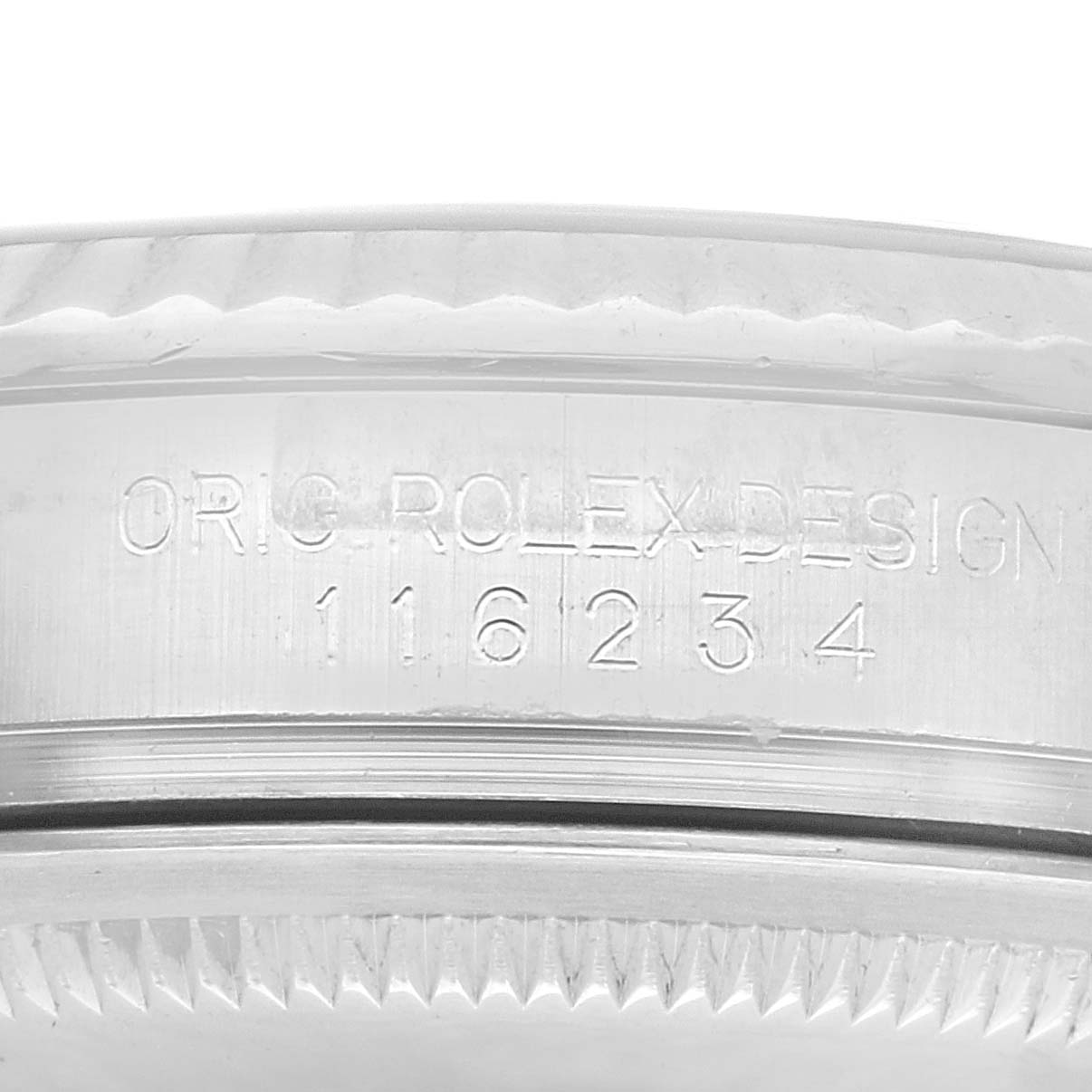 The image shows a close-up of the case side of a Rolex Datejust 116234 Men's Stainless Steel Blue Dial 116234 Men's Stainless Steel Blue Dial watch, focusing on the model number engraved on the side.