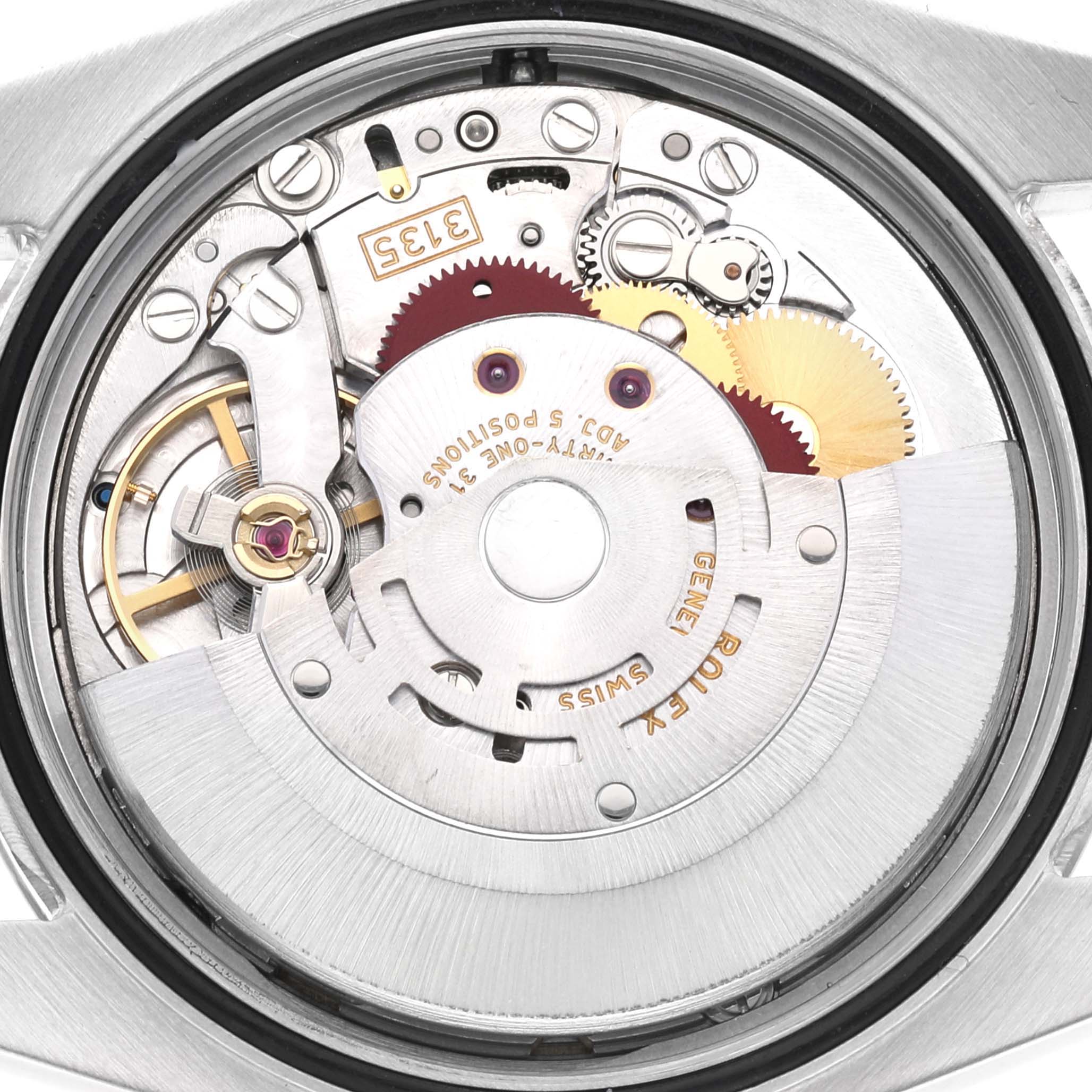 This image shows the inner mechanism of a Rolex Datejust 116234 Men's Stainless Steel Blue Dial 116234 Men's Stainless Steel Blue Dial watch, captured from a rear angle with the caseback removed.