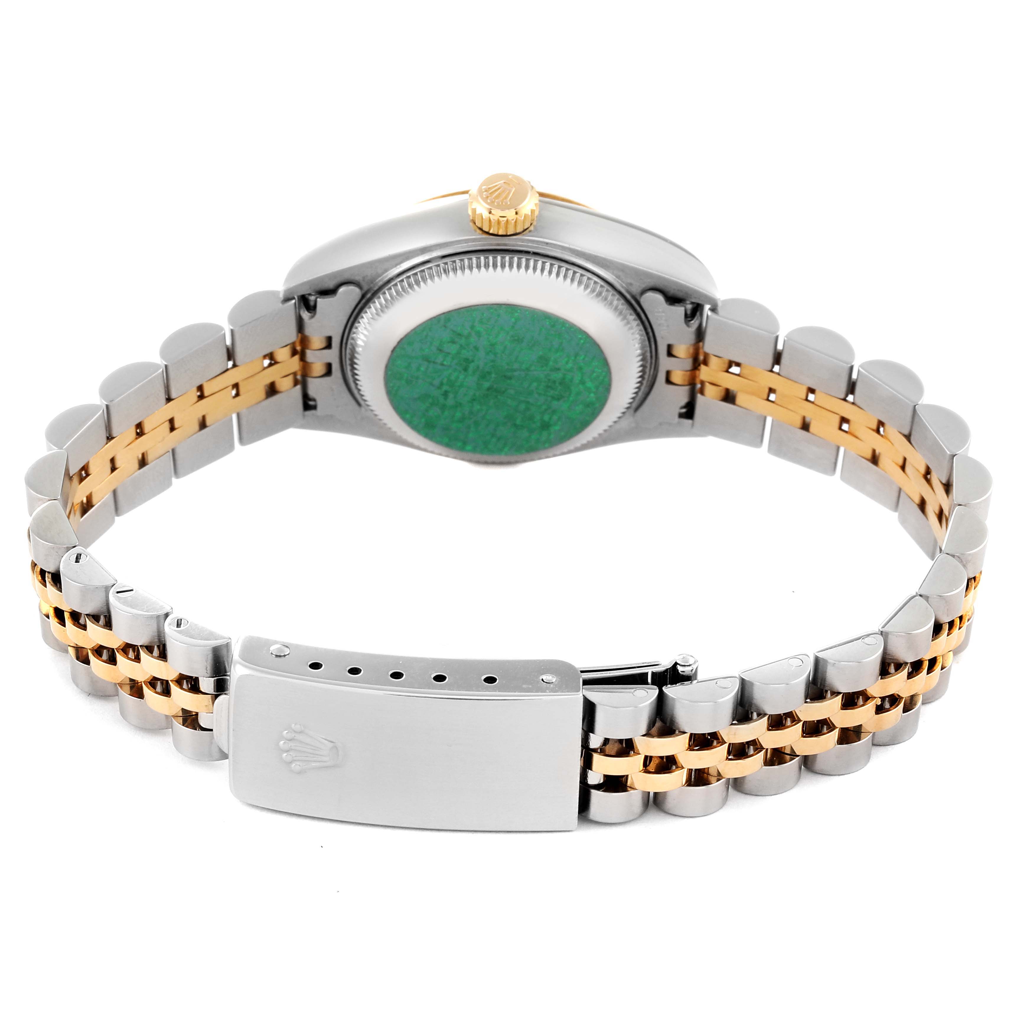 This image shows the back of a Rolex Datejust 79173 Women's Steel and Gold (two tone) Mother of Pearl Dial 79173 Women's Steel and Gold (two tone) Mother of Pearl Dial watch with a view of its two-tone bracelet and closed clasp.