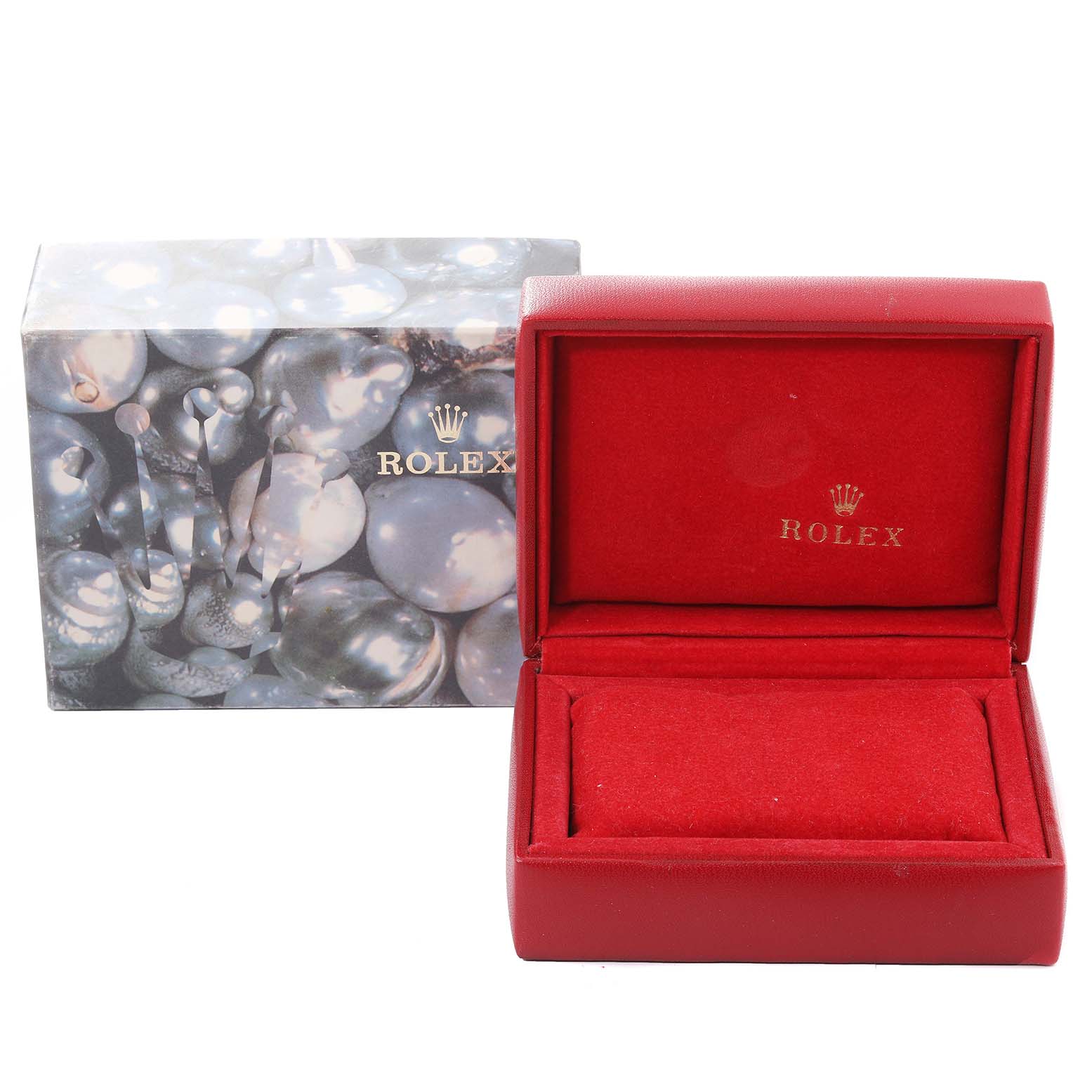 The image shows a Rolex Datejust 79173 Women's Steel and Gold (two tone) Champagne Dial 79173 Women's Steel and Gold (two tone) Champagne Dial watch box, featuring a red interior and an external decorative sleeve with a pearl-like design.