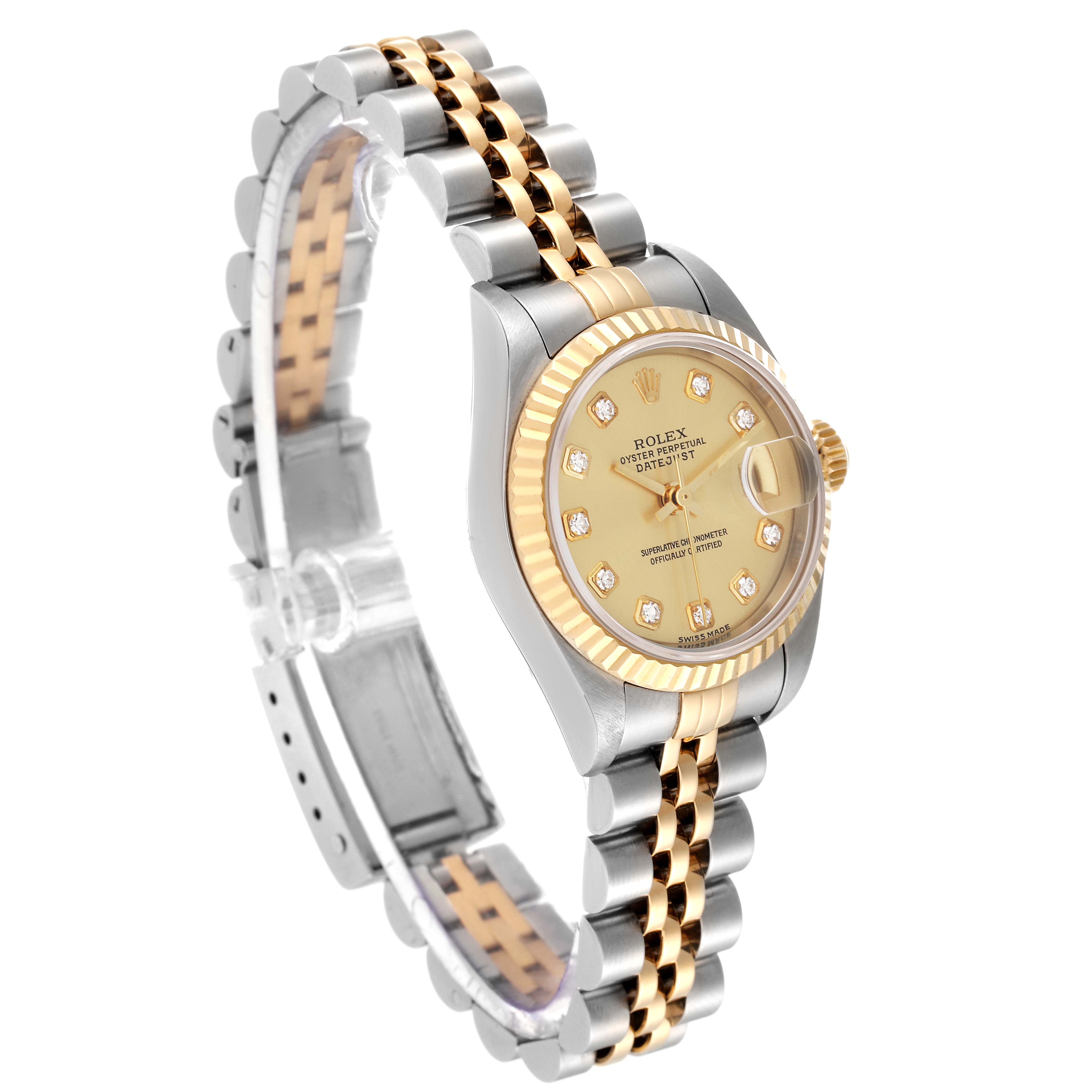 The image shows a Rolex Datejust 79173 Women's Steel and Gold (two tone) Champagne Dial 79173 Women's Steel and Gold (two tone) Champagne Dial watch angled to highlight its face, bezel, and Jubilee bracelet.