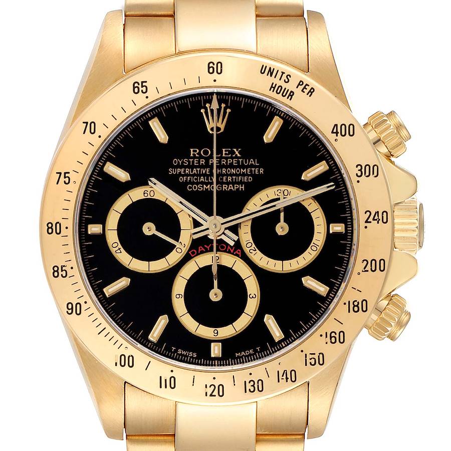 This image shows a close-up, front view of a Rolex Daytona watch, highlighting its black dial, chronograph subdials, and gold casing.