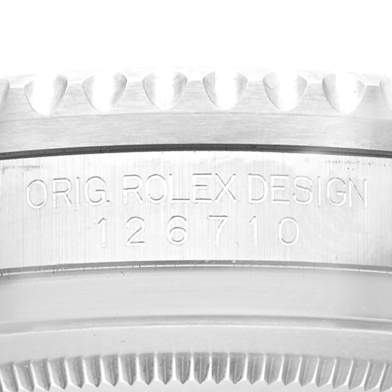 This image shows a close-up of the case side of a Rolex GMT-Master 126710BLNR Men
s Stainless Steel Black Dial 126710BLNR Men
s Stainless Steel Black Dial, highlighting the engraved model number "126710."