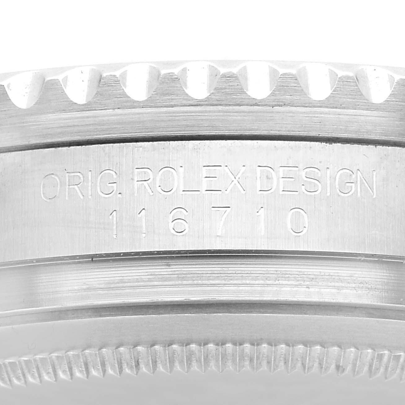 The image shows a close-up of the engraved side of a Rolex GMT-Master 116710LN Men
s Stainless Steel Black Dial 116710LN Men
s Stainless Steel Black Dial watch case, displaying the model number "116710."