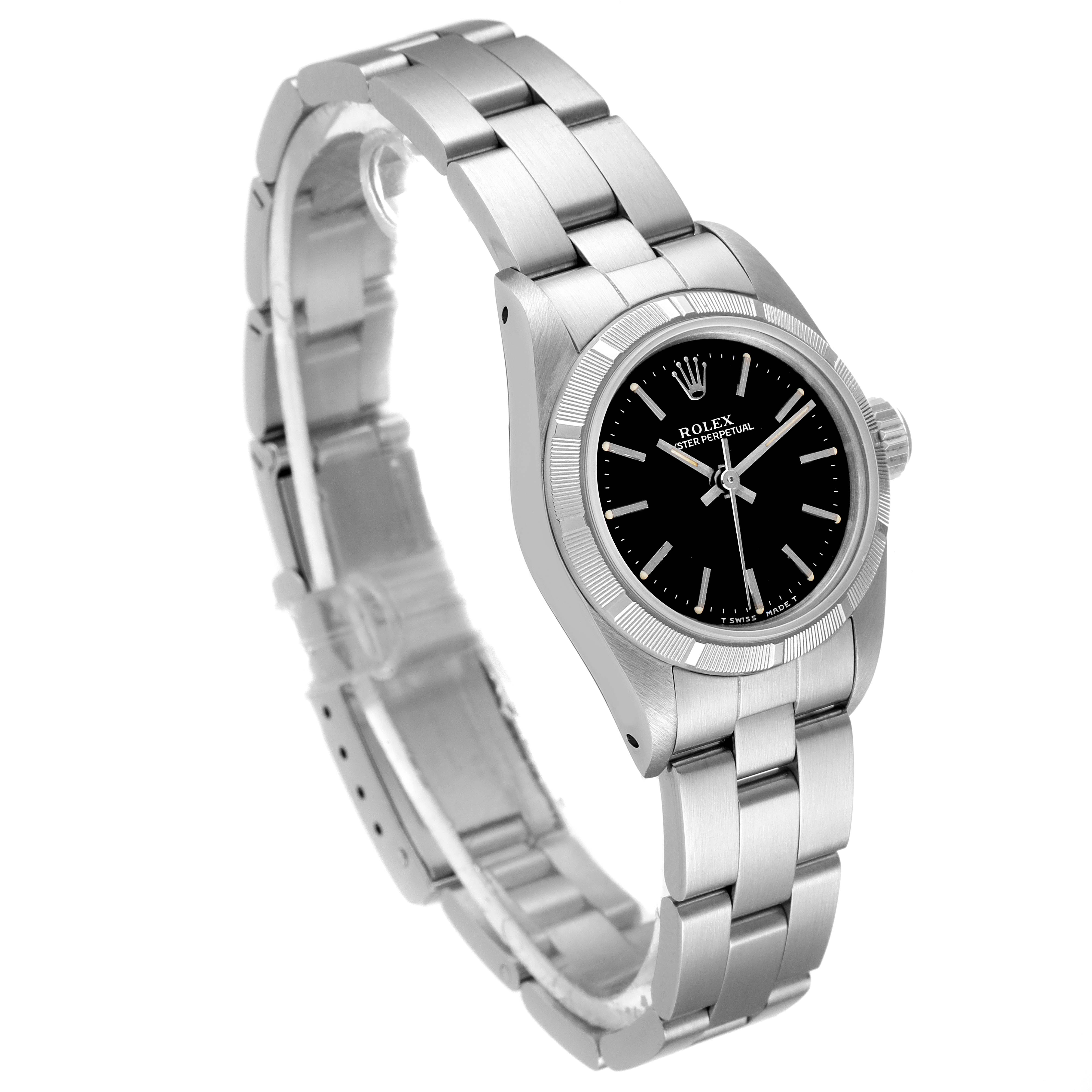 The Rolex Oyster Perpetual 67230 Women's Stainless Steel Black Dial 67230 Women's Stainless Steel Black Dial watch is shown from an angled top view, displaying its face, bezel, and bracelet.