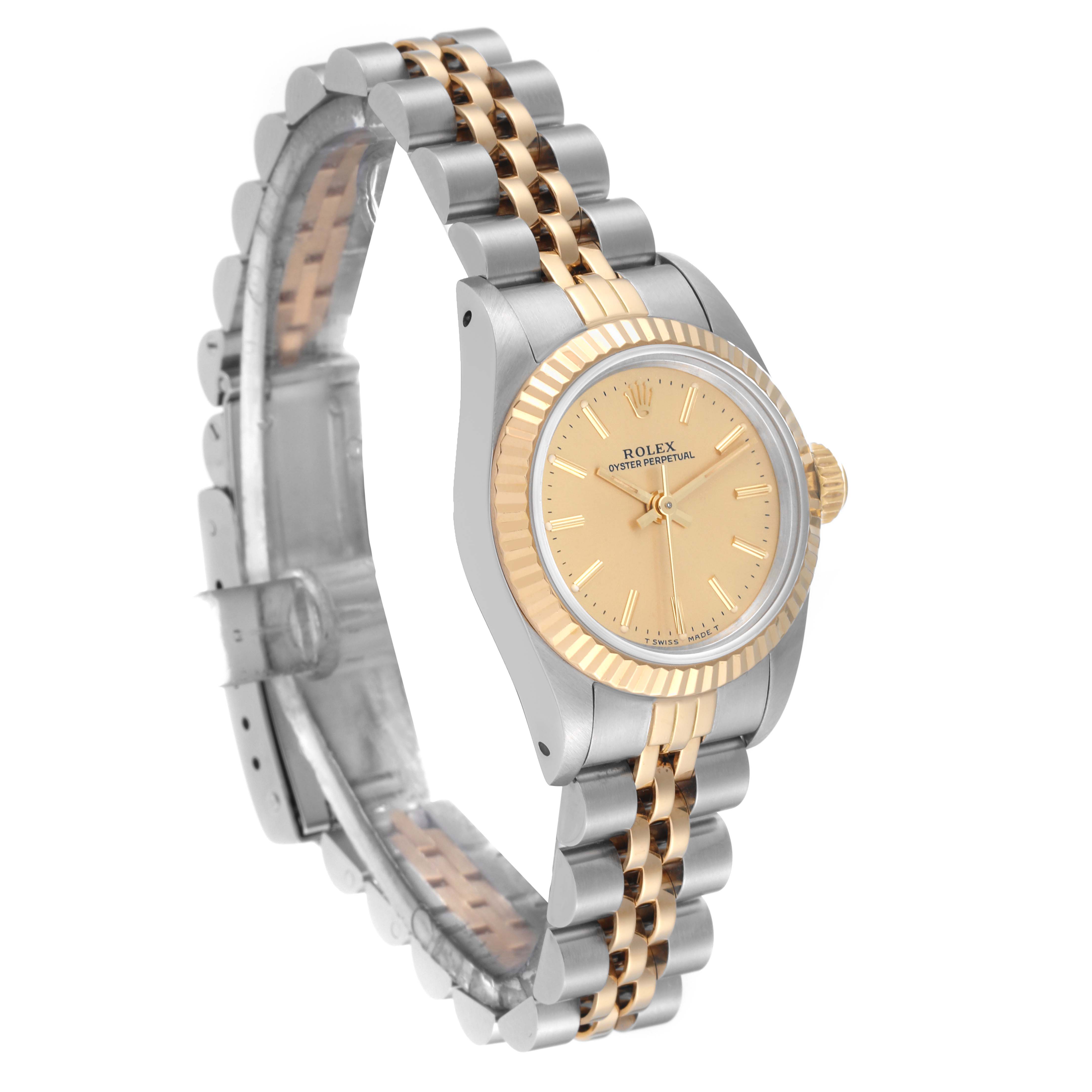 The image shows a side angle of a Rolex Oyster Perpetual 67193 Women's Steel and Gold (two tone) Champagne Dial 67193 Women's Steel and Gold (two tone) Champagne Dial watch, highlighting the gold and silver bracelet and gold bezel.