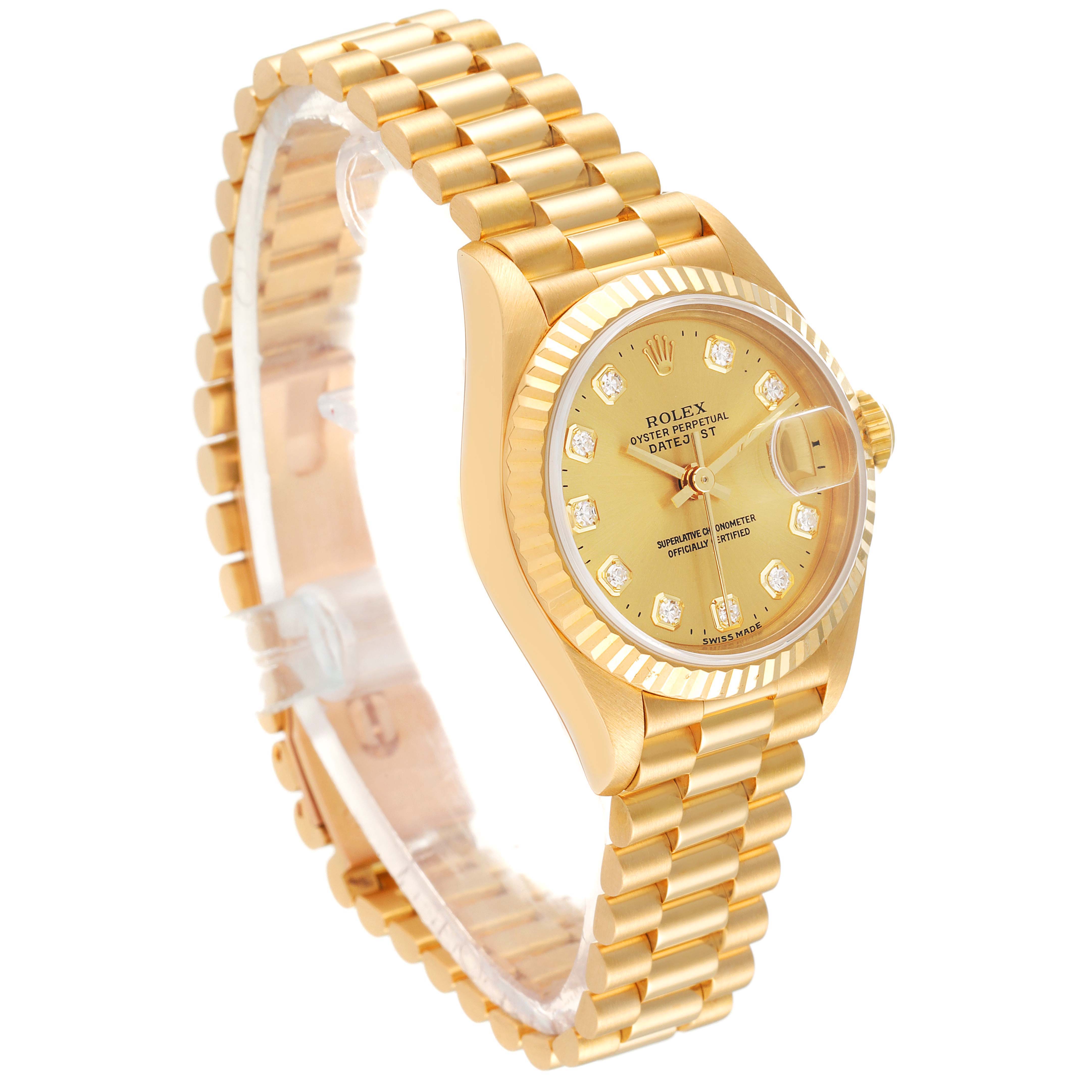 The image shows a Rolex President 69178 Women
s Yellow Gold Champagne Dial 69178 Women
s Yellow Gold Champagne Dial model watch at a slight side angle, displaying its gold bracelet, dial, and bezel.