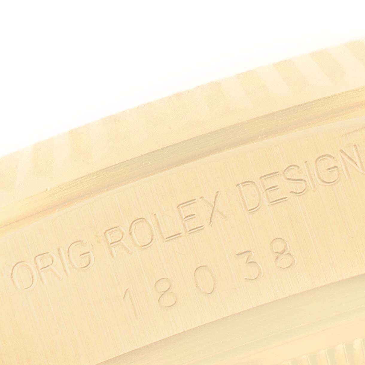 This image shows a close-up of the engraved case back of a Rolex President 18038 Men
s Yellow Gold Champagne Dial 18038 Men
s Yellow Gold Champagne Dial model watch.