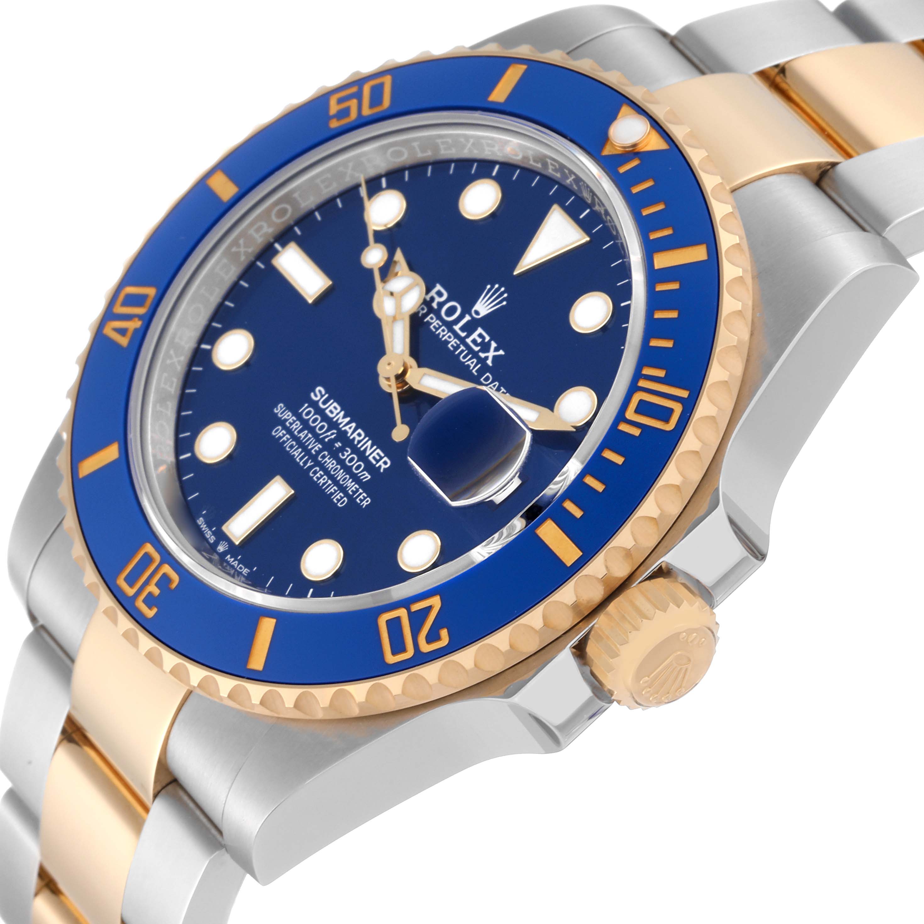 The image shows an angled view of a Rolex Submariner 126613LB Men
s Steel and Gold (two tone) Blue Dial 126613LB Men
s Steel and Gold (two tone) Blue Dial watch, highlighting its blue bezel, blue dial, and two-tone bracelet.