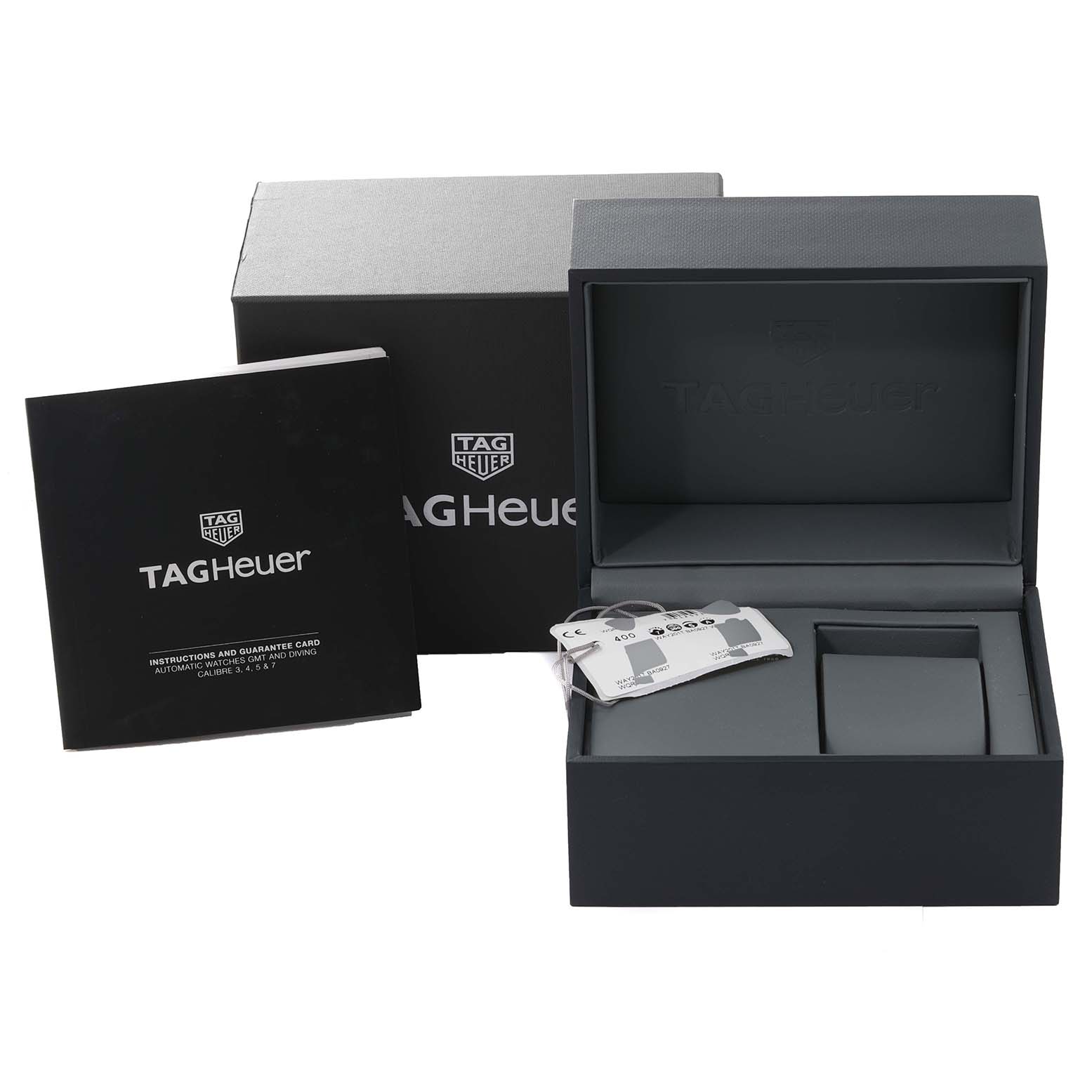 This image shows the box, instructions manual, and guarantee card for the Tag Heuer Aquaracer WAY201T.BA0927 Men's Stainless Steel Blue Dial WAY201T.BA0927 Men's Stainless Steel Blue Dial watch.