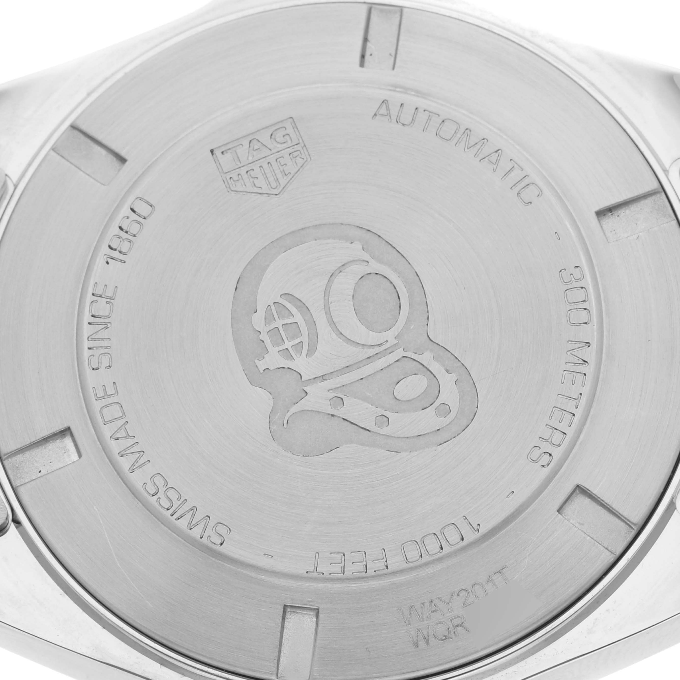 The image shows the rear side of the Tag Heuer Aquaracer WAY201T.BA0927 Men's Stainless Steel Blue Dial WAY201T.BA0927 Men's Stainless Steel Blue Dial watch, featuring its case back with engraved details and logo.