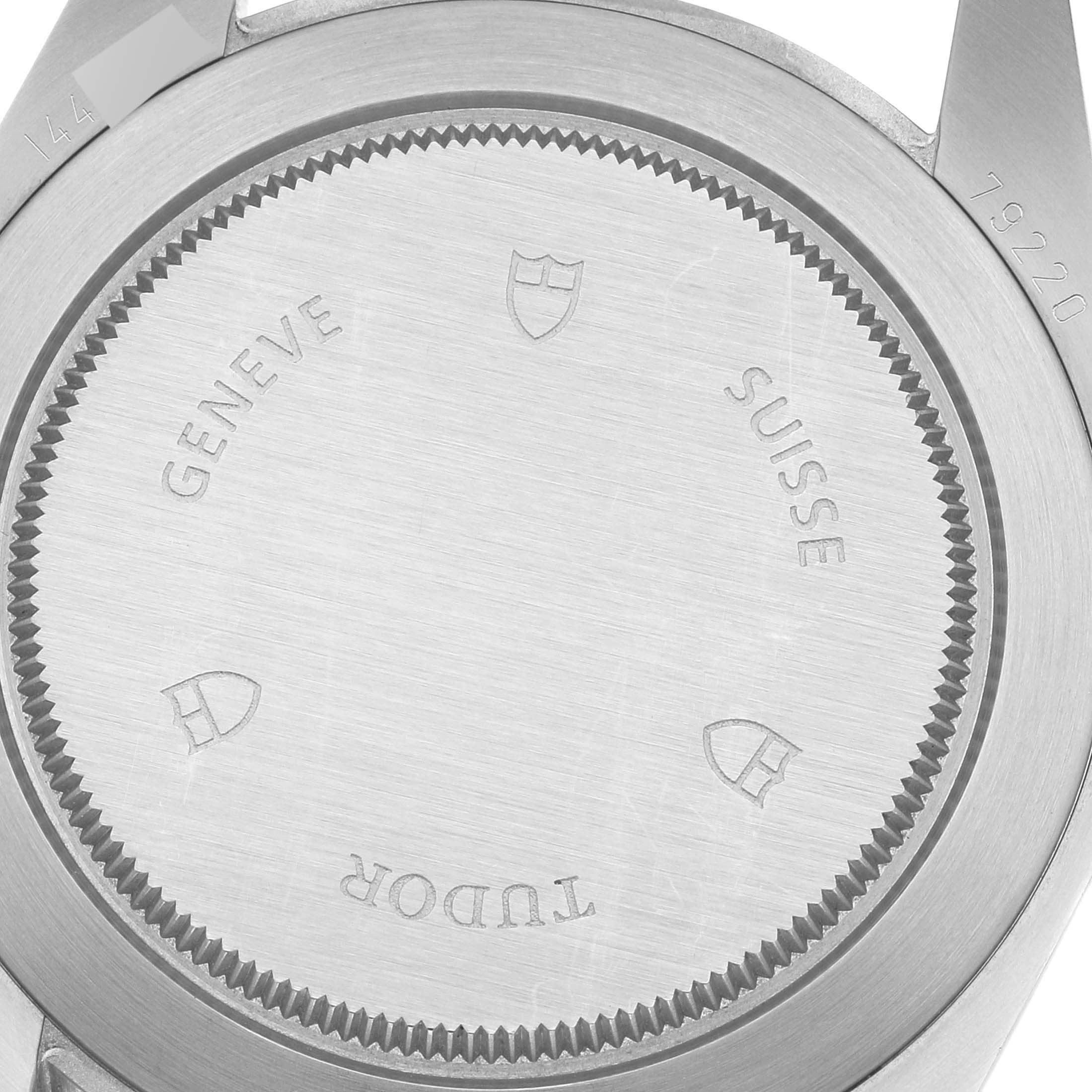 This image shows the case back of the Tudor Heritage Black Bay 79220B Men
s Stainless Steel Black Dial 79220B Men
s Stainless Steel Black Dial watch from a straight-on angle.