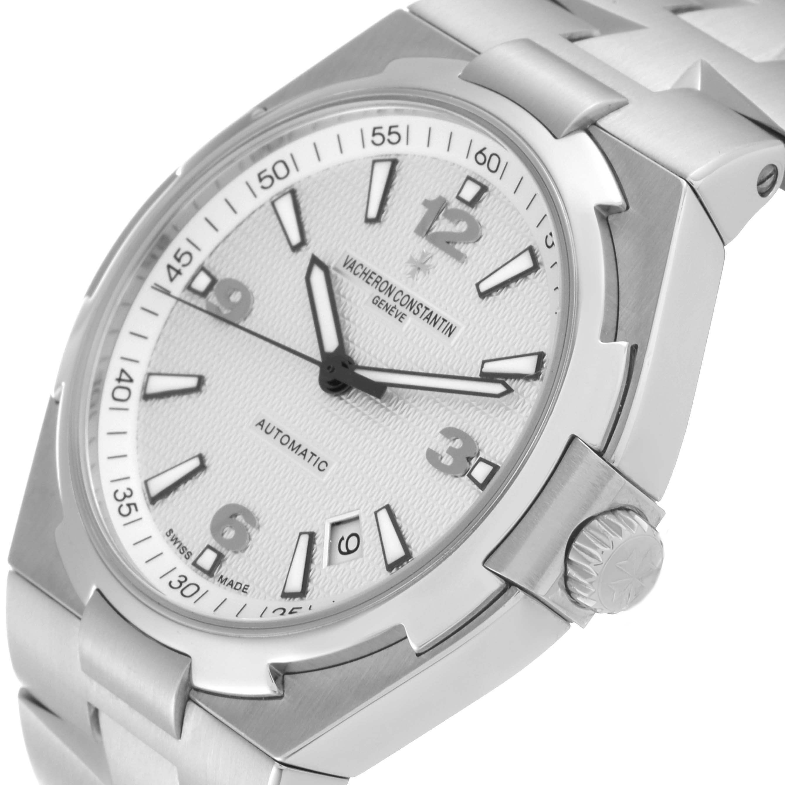 The image shows a close-up angled view of the Vacheron Constantin Overseas 47040 Men's Stainless Steel Silver Dial 47040 Men's Stainless Steel Silver Dial watch, highlighting the dial, bezel, crown, and part of the bracelet.