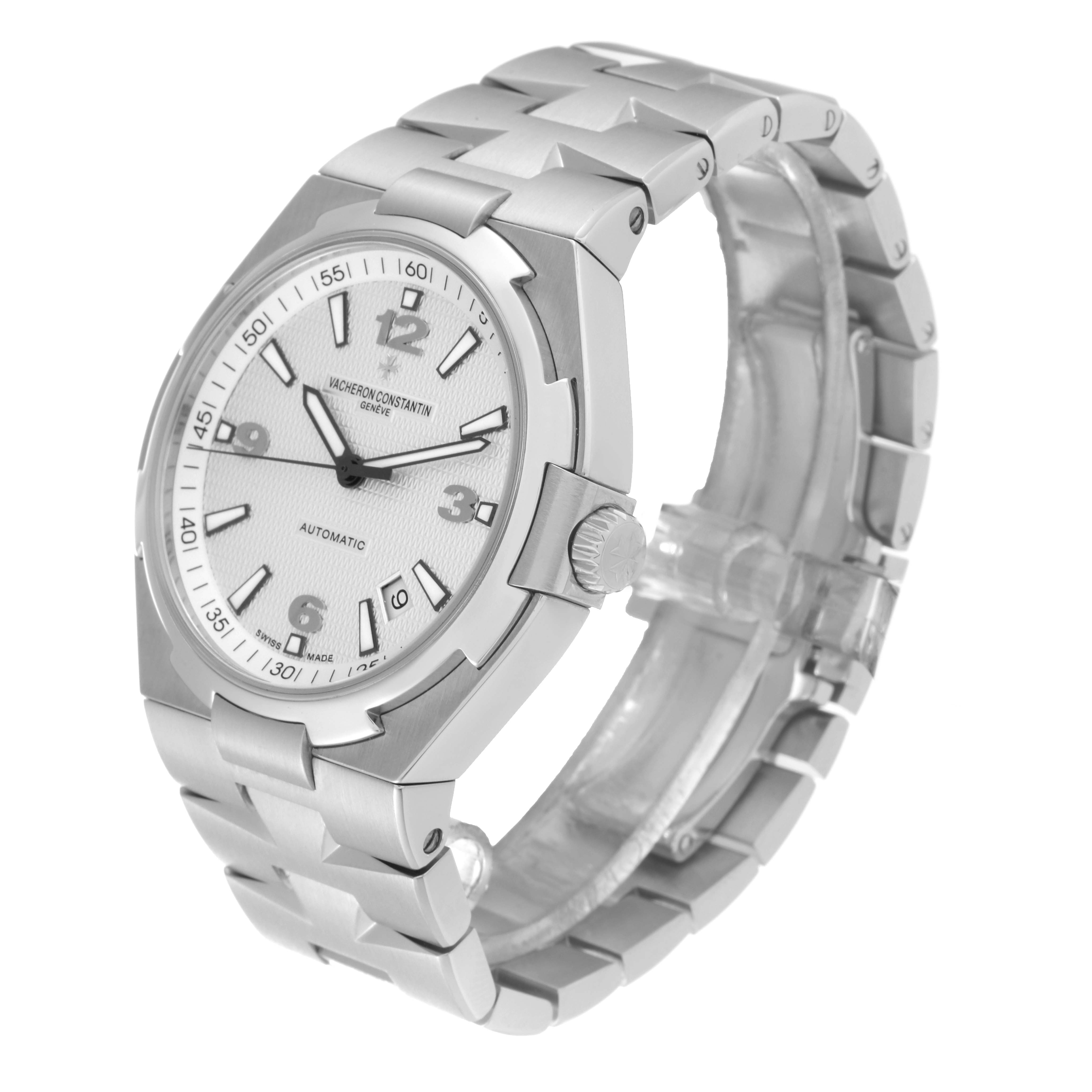 The image shows a Vacheron Constantin Overseas 47040 Men's Stainless Steel Silver Dial 47040 Men's Stainless Steel Silver Dial watch angled slightly left, displaying the face, bezel, crown, and part of the bracelet.