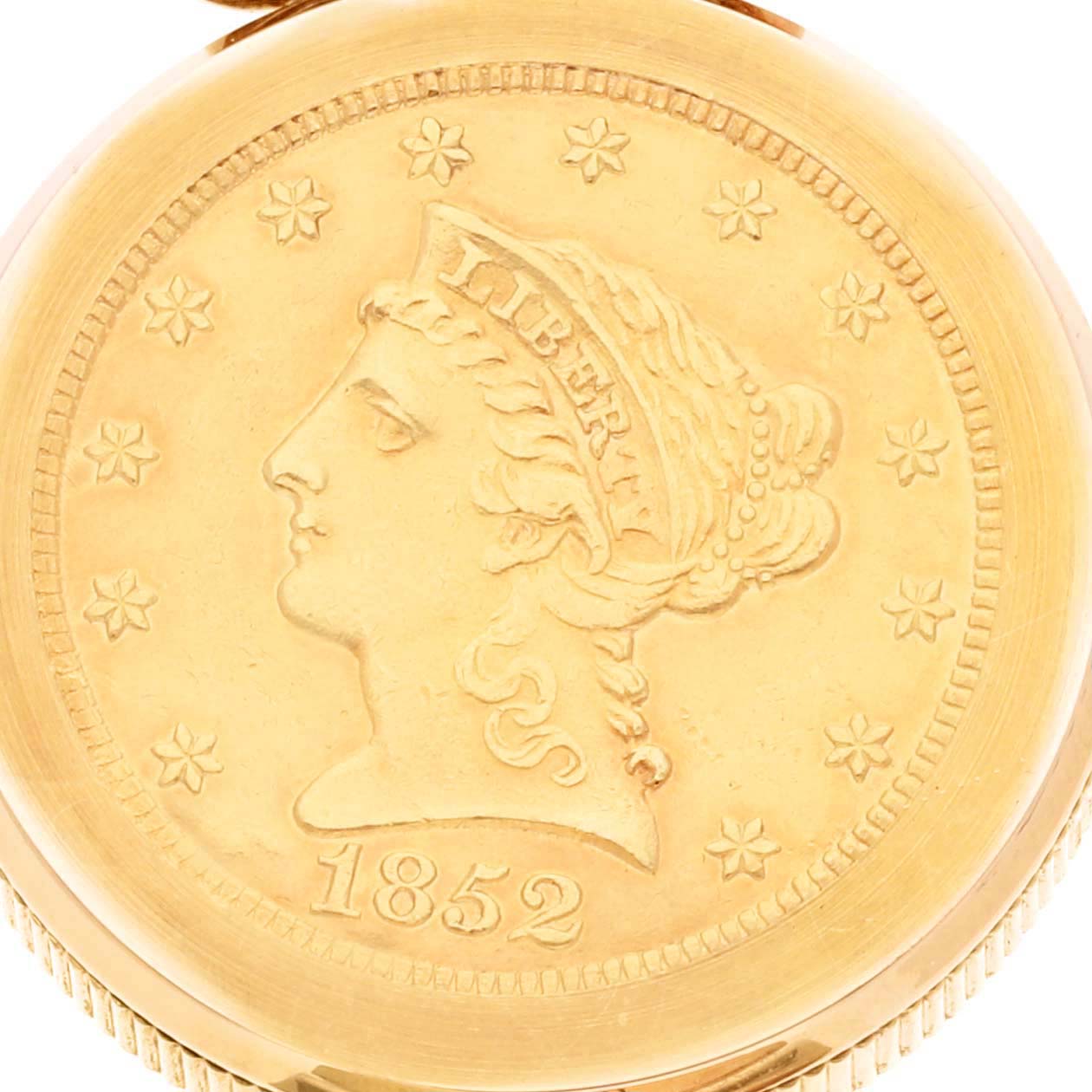 This image shows a close-up of the face of the Corum 1852 Women
s Yellow Gold Champagne Dial 1852 Women
s Yellow Gold Champagne Dial 2.5 Dollars Eagle Liberty Coin Yellow Gold Ladies Watch model from 1852.