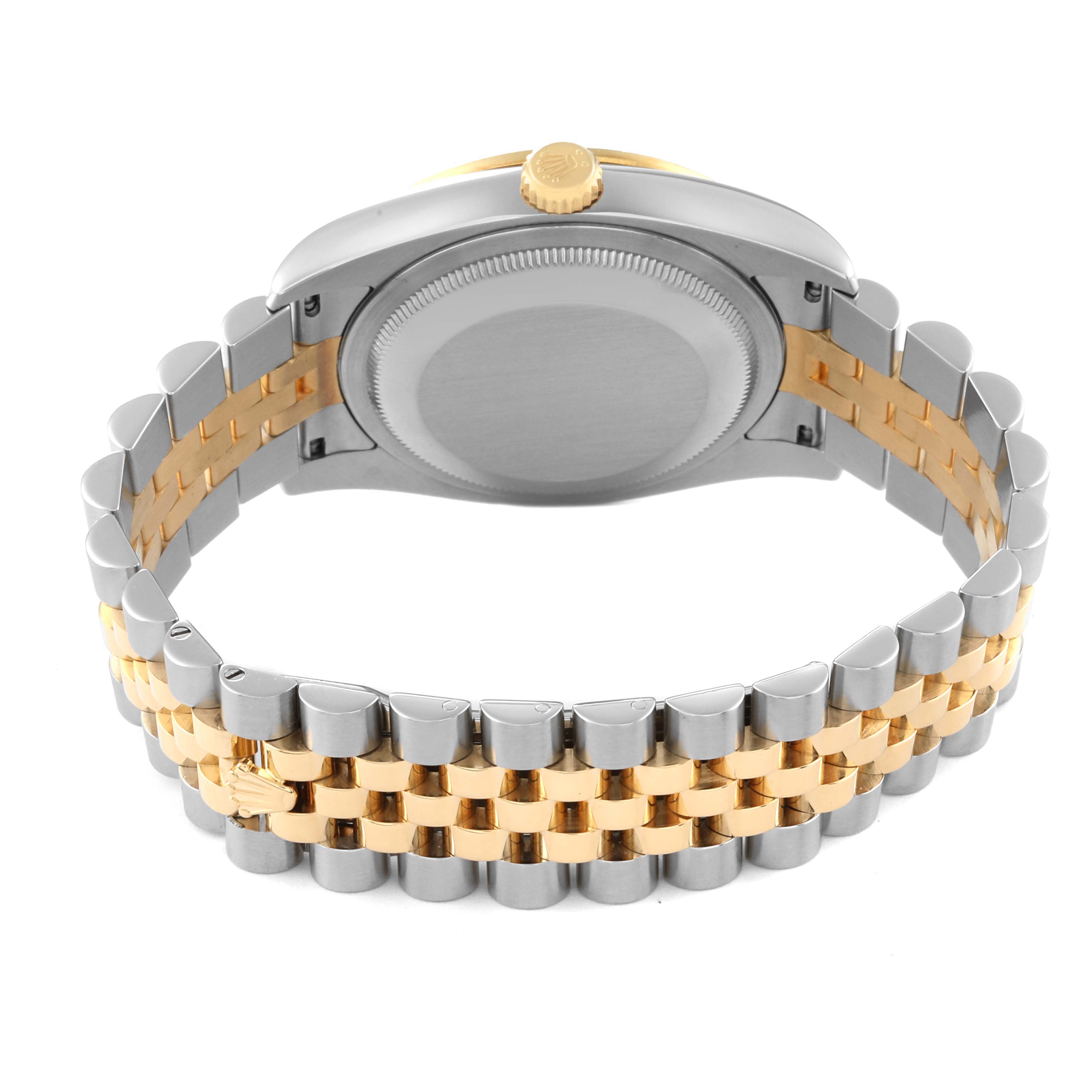The image shows the back of the Rolex Datejust 116243 Men's Steel and Gold (two tone) Champagne Dial 116243 Men's Steel and Gold (two tone) Champagne Dial watch, highlighting the two-tone bracelet and case back in a side-view angle.