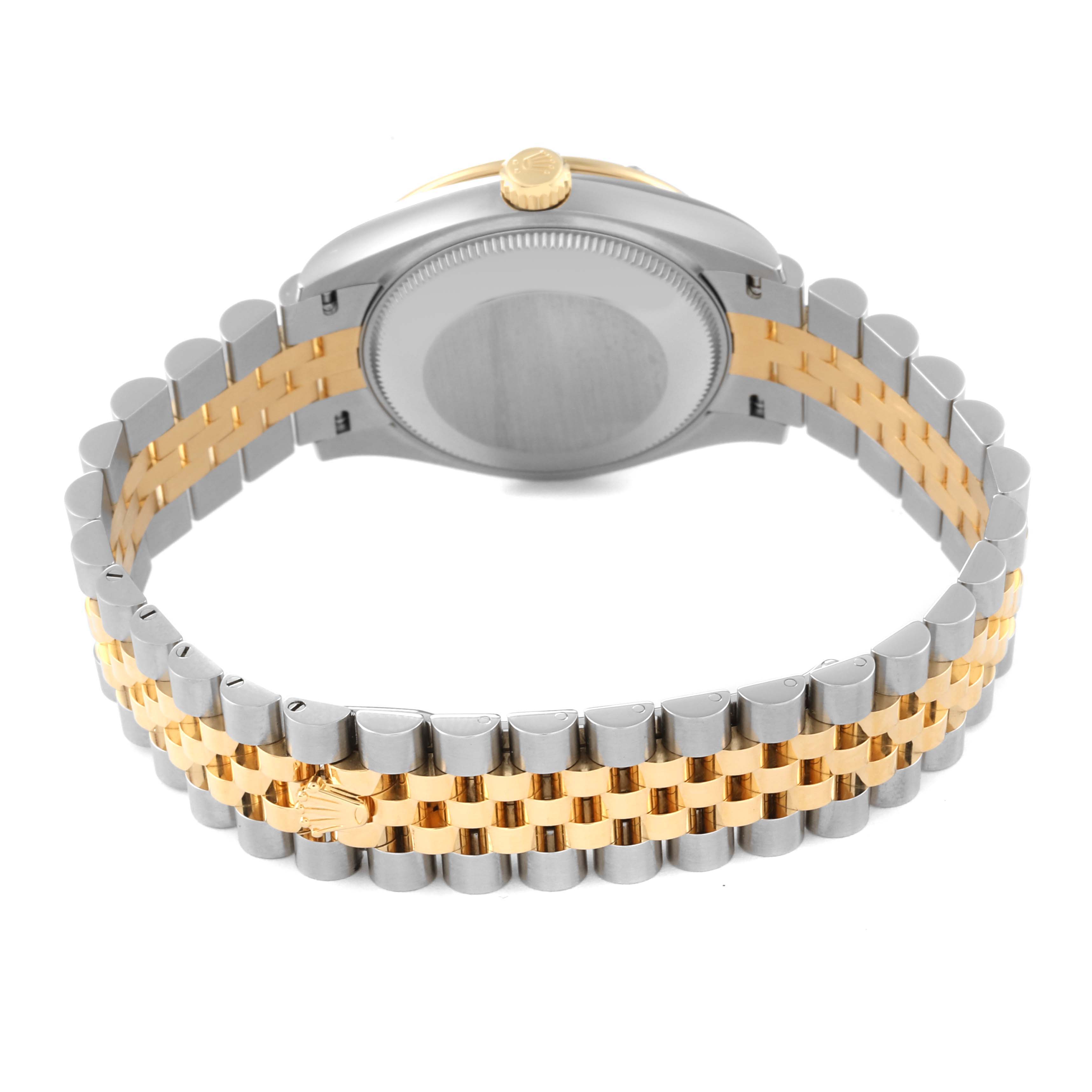 The image displays the back and bracelet of a mid-size Rolex watch, showing the two-tone metal design.