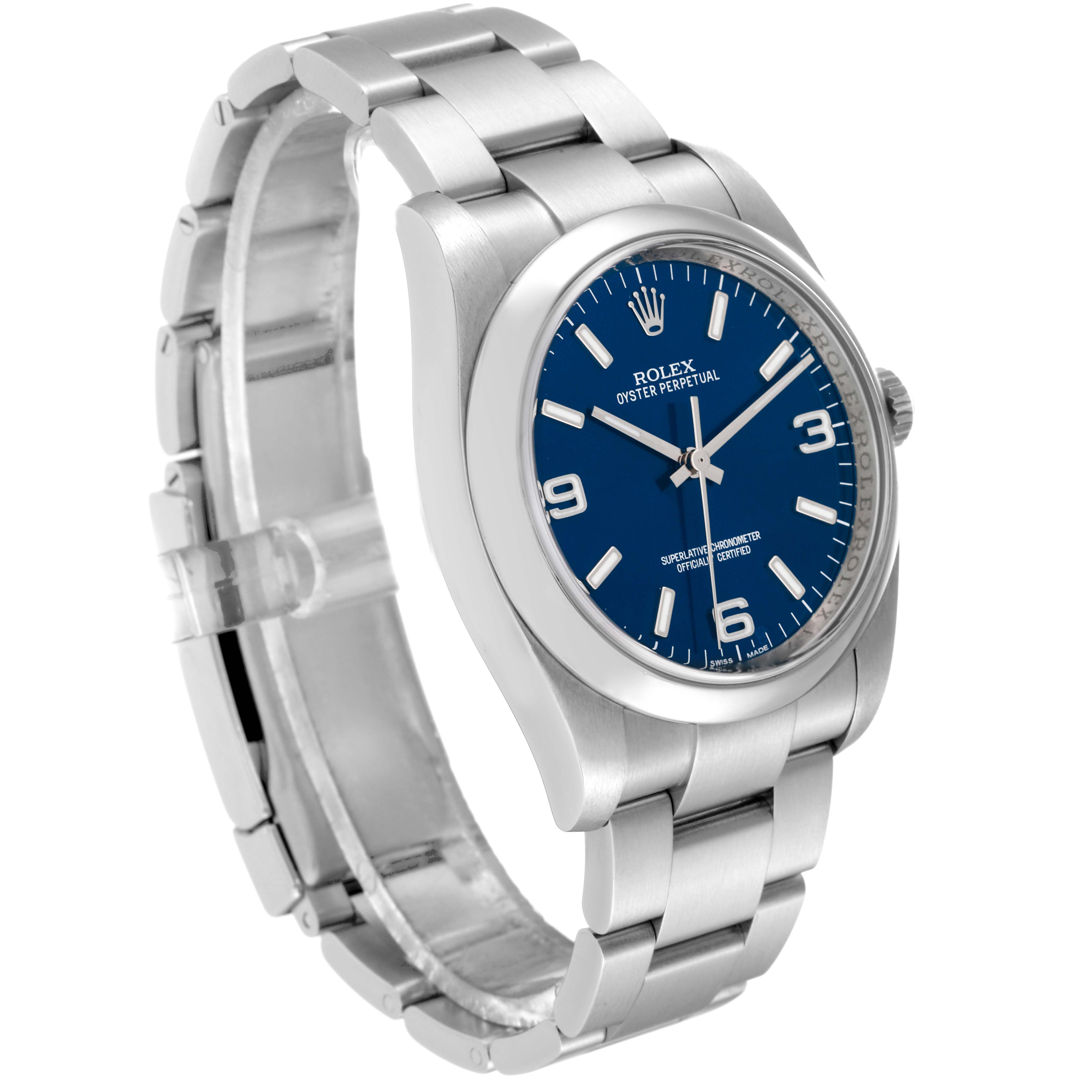 The image shows a Rolex Oyster Perpetual 116000 Men
s Stainless Steel Blue Dial 116000 Men
s Stainless Steel Blue Dial watch from a three-quarter angle, highlighting its blue dial, case, and bracelet.