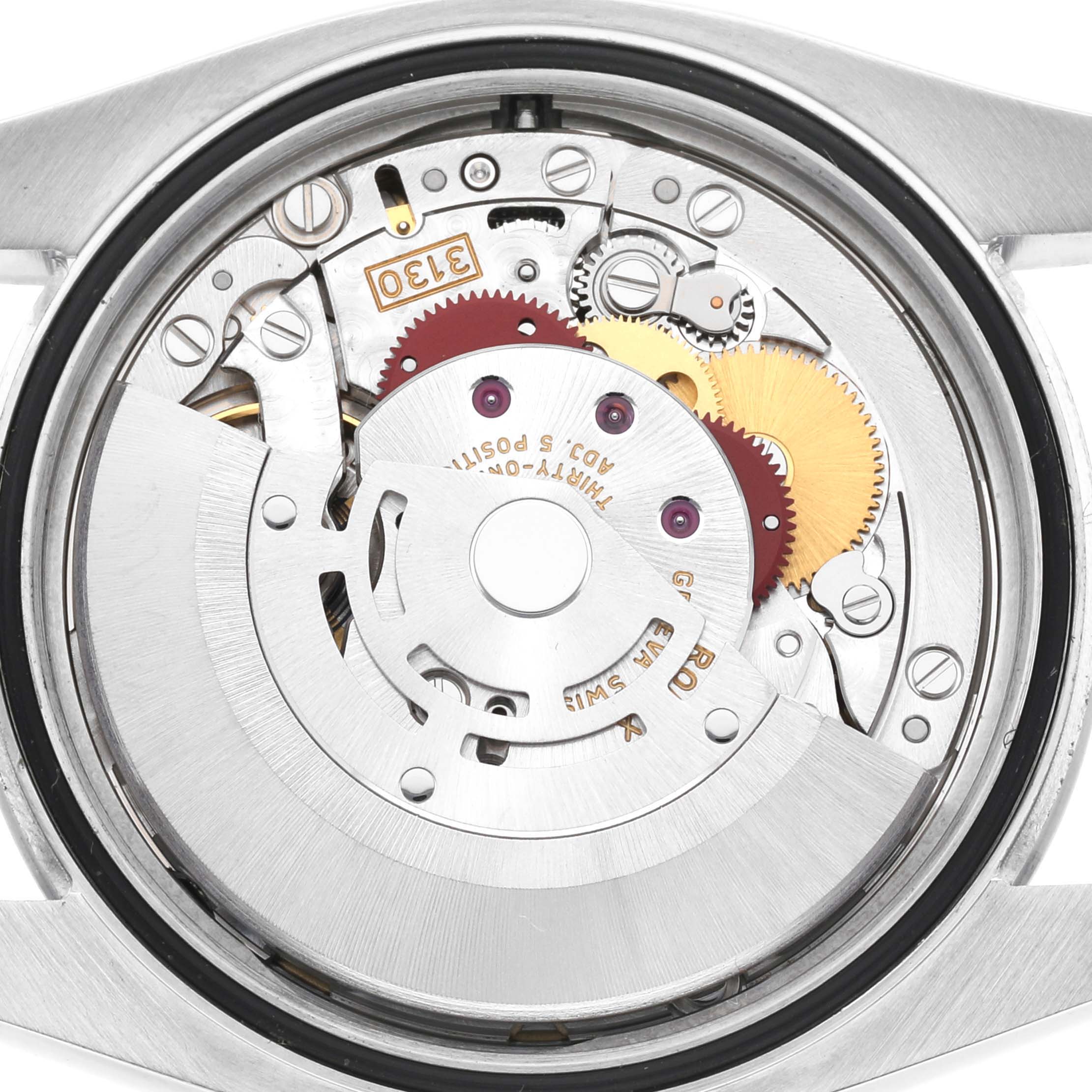 This image shows the internal mechanism and movement of the Rolex Oyster Perpetual 116000 Men
s Stainless Steel Blue Dial 116000 Men
s Stainless Steel Blue Dial watch, viewed from the back.