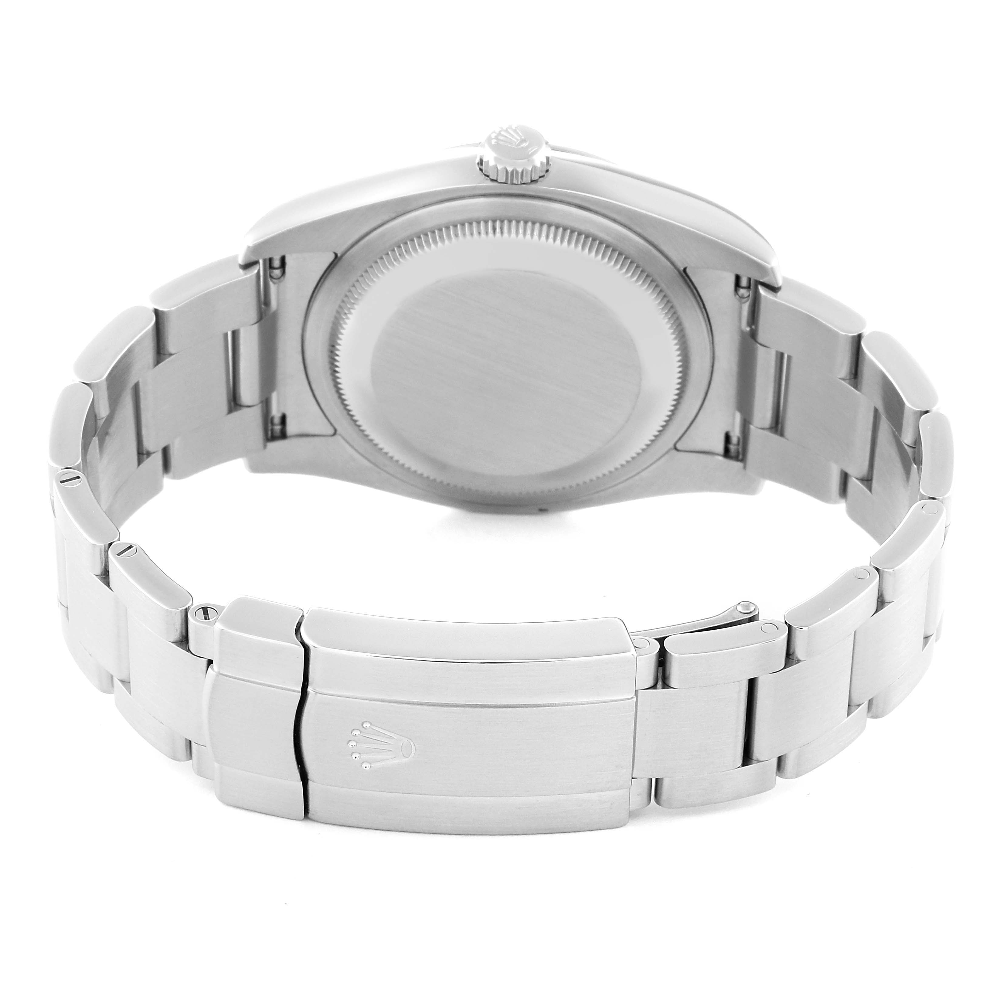 The image shows the back view of a Rolex Oyster Perpetual 116000 Men
s Stainless Steel Blue Dial 116000 Men
s Stainless Steel Blue Dial watch, highlighting the case back, crown, and bracelet with the clasp.