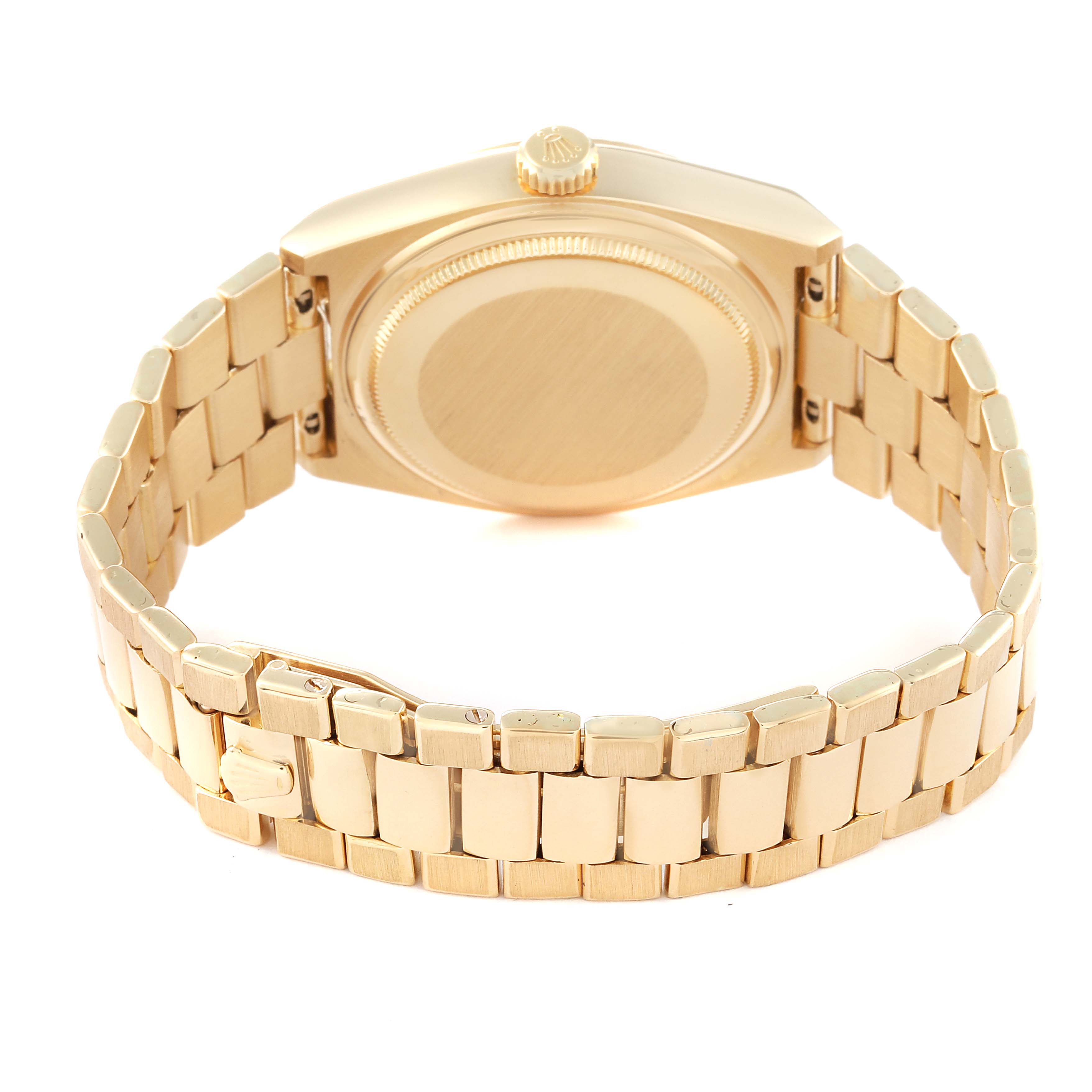 The image shows the back of a Rolex Oysterquartz 19018 Men's Yellow Gold Champagne Dial 19018 Men's Yellow Gold Champagne Dial watch, highlighting its gold bracelet and clasp.